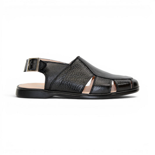 The Duca Di Matiste Duca SA131 Black is an Italian-made sandal in black leather, featuring a closed toe, side cutouts, and a slingback buckle strap, shown in profile against a white background.