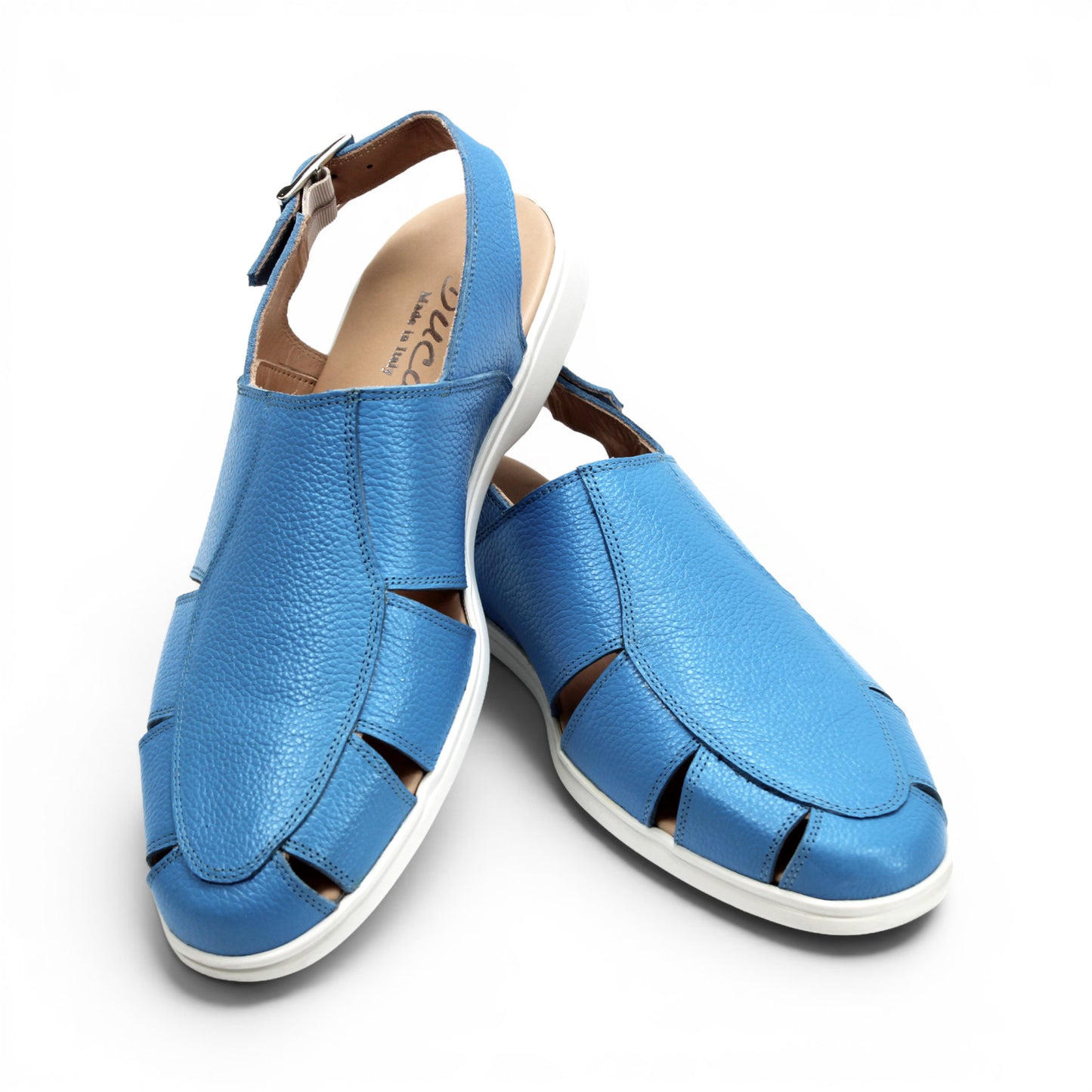 The Duca Di Matiste Duca SA131 Light Blue is an Italian-made sandal in printed calf leather with a white sole, side buckle, and cutout details, displayed in profile on a white background.