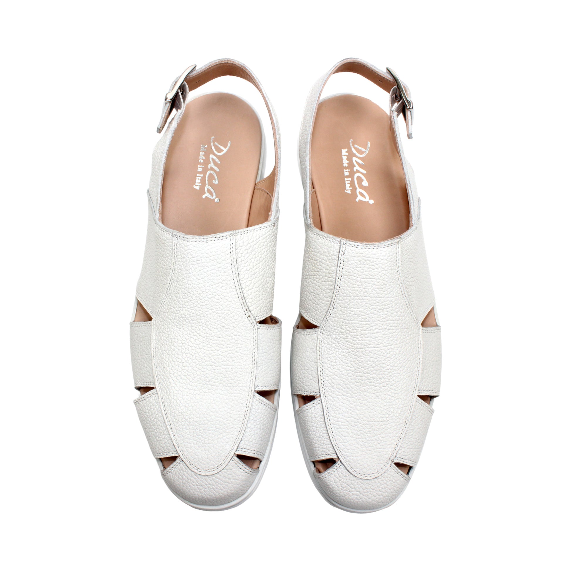 The Duca Di Matiste Duca SA131 White sandal features printed calf leather with cut-out sides, an adjustable buckle ankle strap, and a rubber sole, shown elegantly against a plain white background.