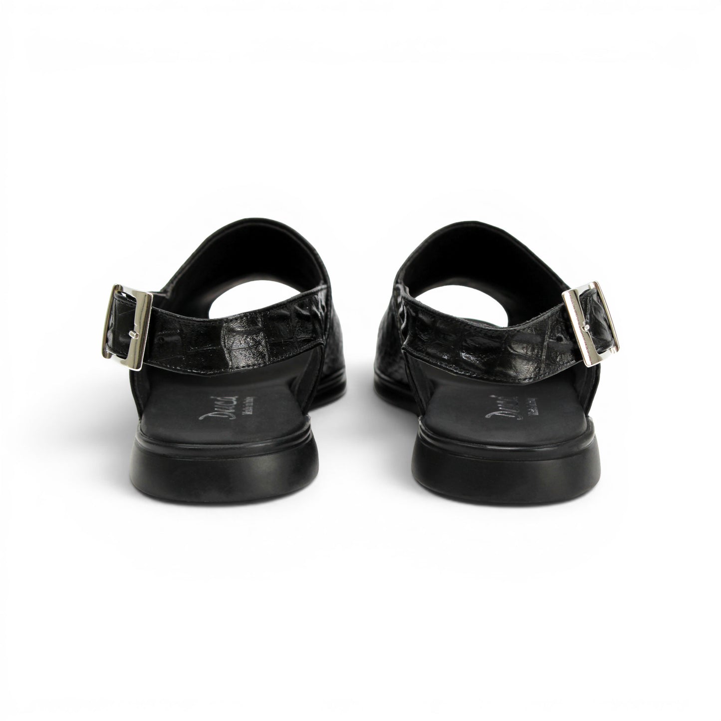 The Duca Di Matiste Duca SA136 Black sandal features faux-crocodile texture, open toe, closed back, adjustable buckle strap, and flat sole. Shown in side view on a white background.