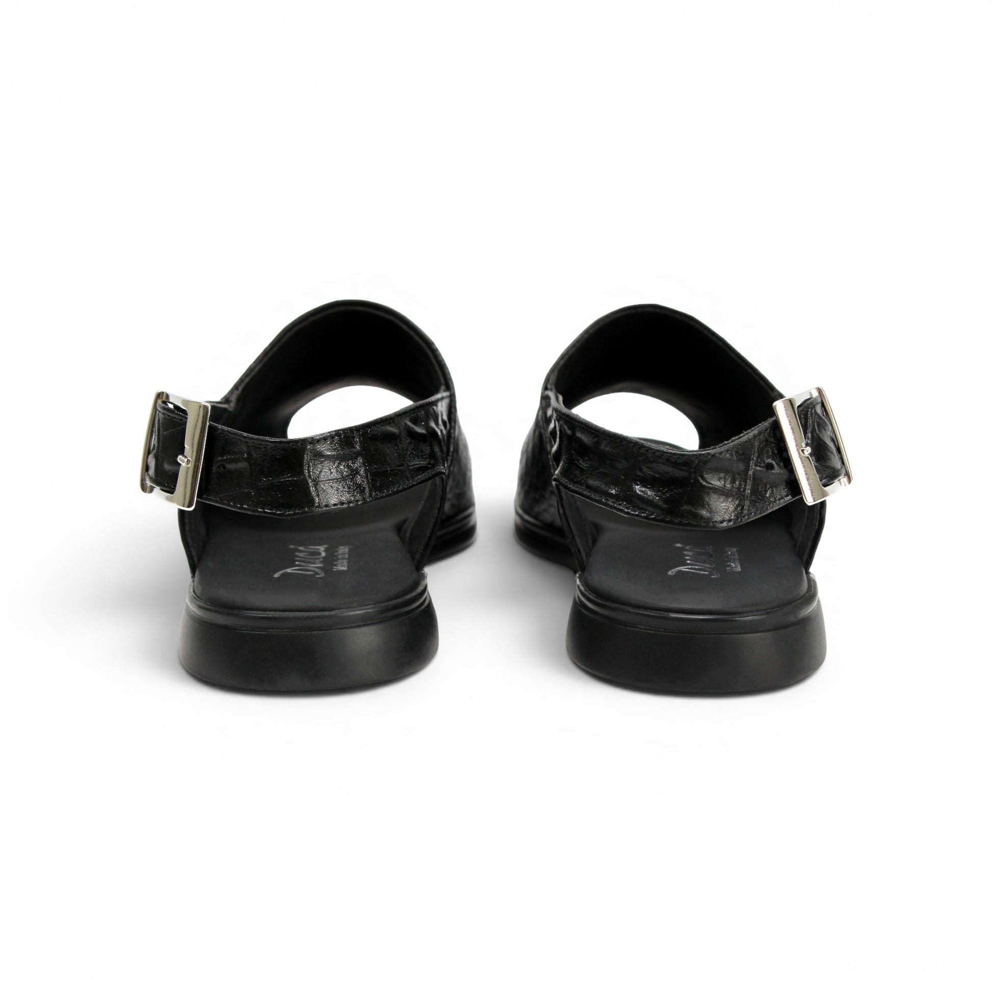 The Duca Di Matiste Duca SA136 Black sandal features faux-crocodile texture, open toe, closed back, adjustable buckle strap, and flat sole. Shown in side view on a white background.