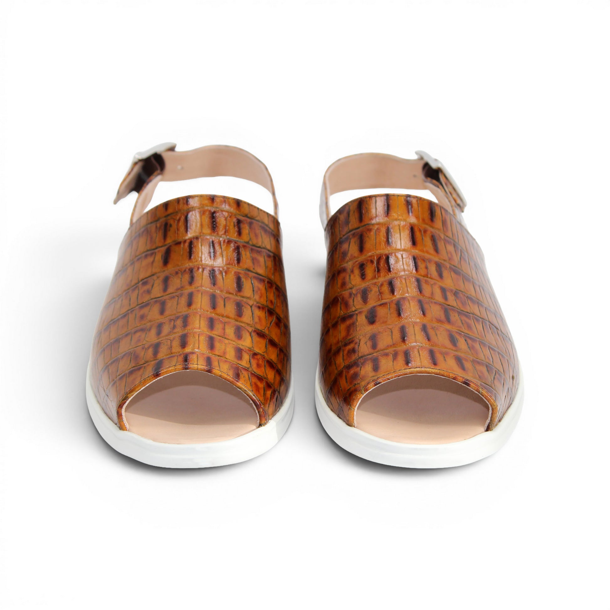 The Duca Di Matiste Duca SA136 Cognac sandal features brown crocodile-patterned calf leather, a closed toe, adjustable buckle strap, and white flat sole for modern comfort, shown on a white background.