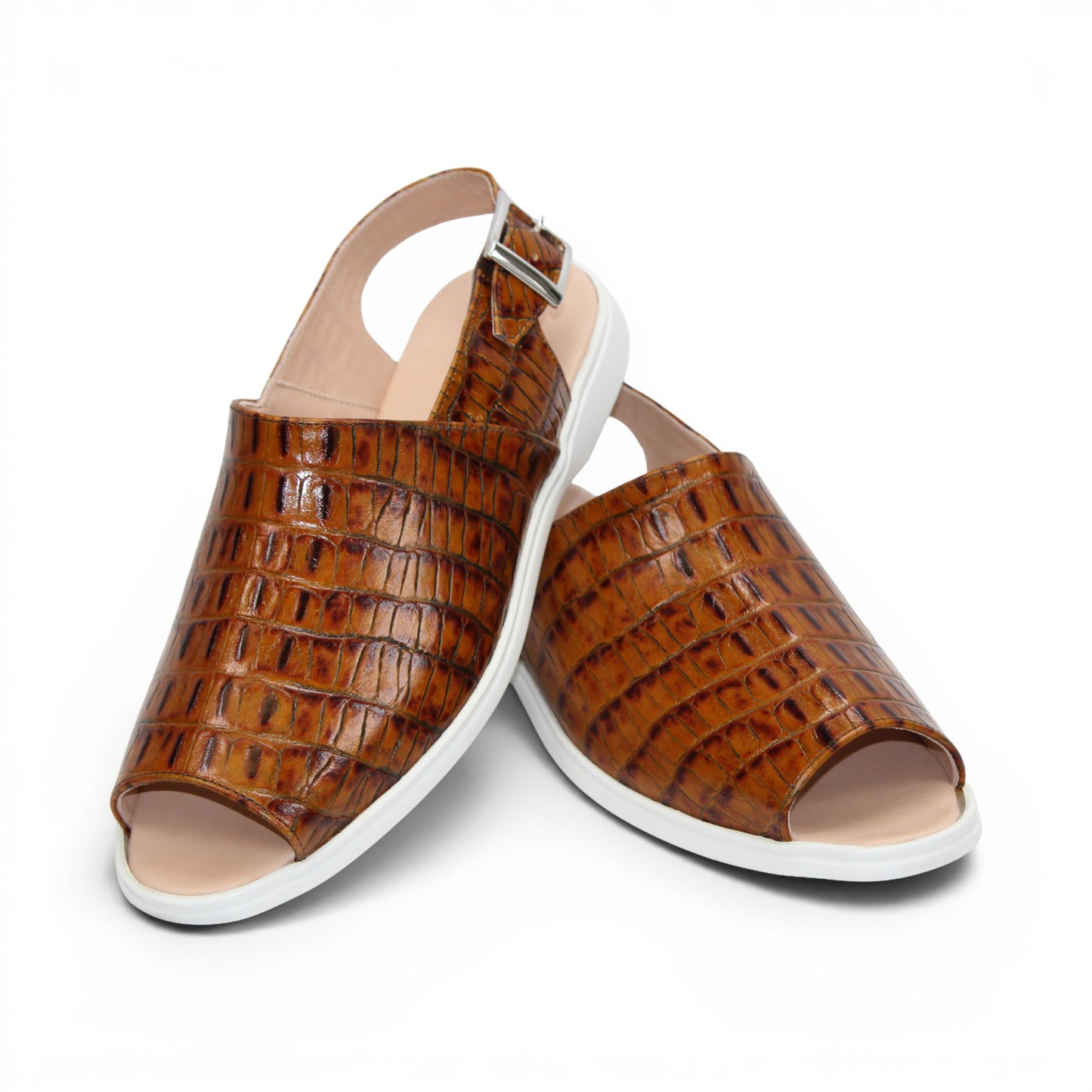 The Duca Di Matiste Duca SA136 Cognac sandal features brown crocodile-patterned calf leather, a closed toe, adjustable buckle strap, and white flat sole for modern comfort, shown on a white background.
