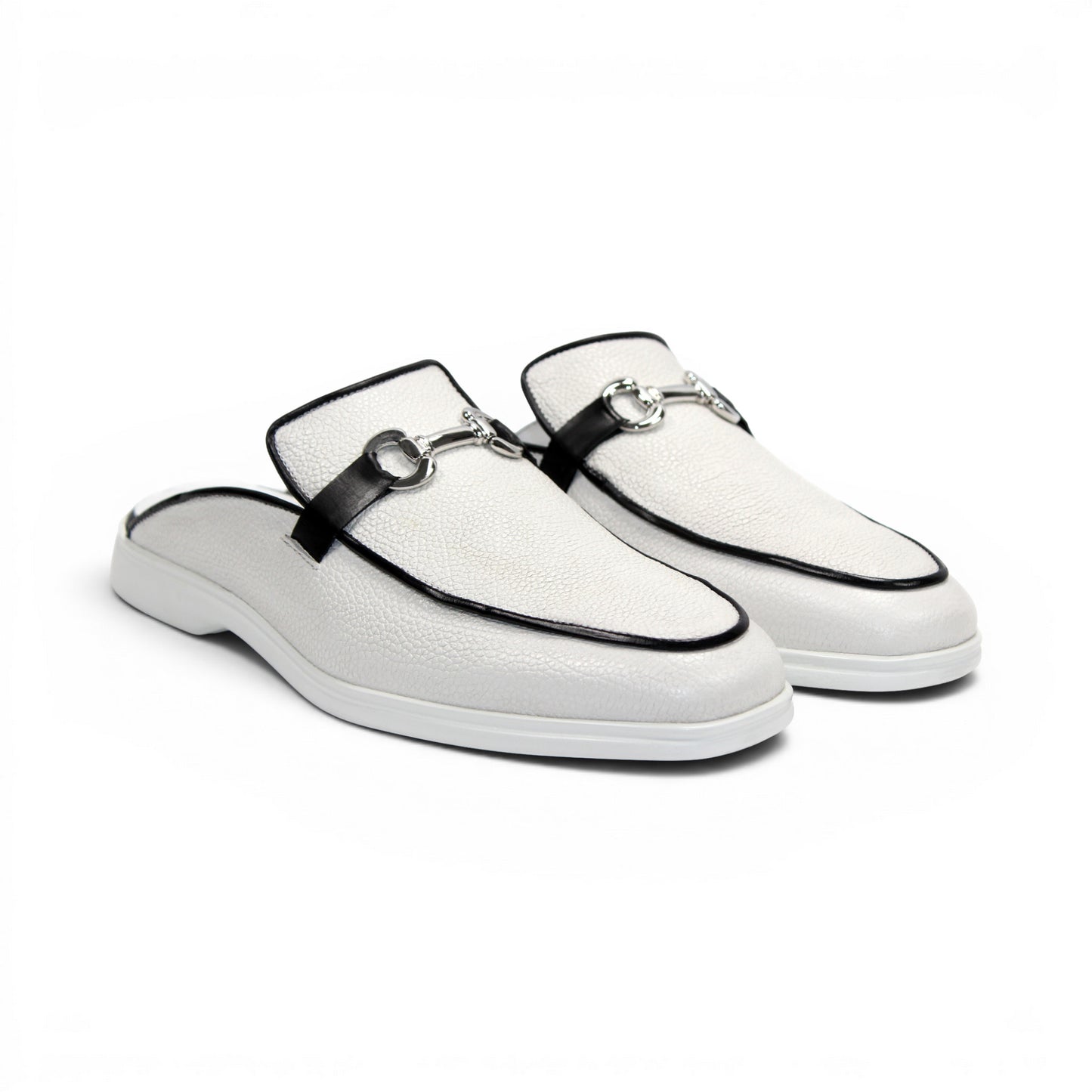 The Duca Di Matiste Duca SA493 White/Black is a white Italian leather slip-on mule with a black trim, low heel, metal buckle, and durable rubber sole, shown in profile against a plain white background.