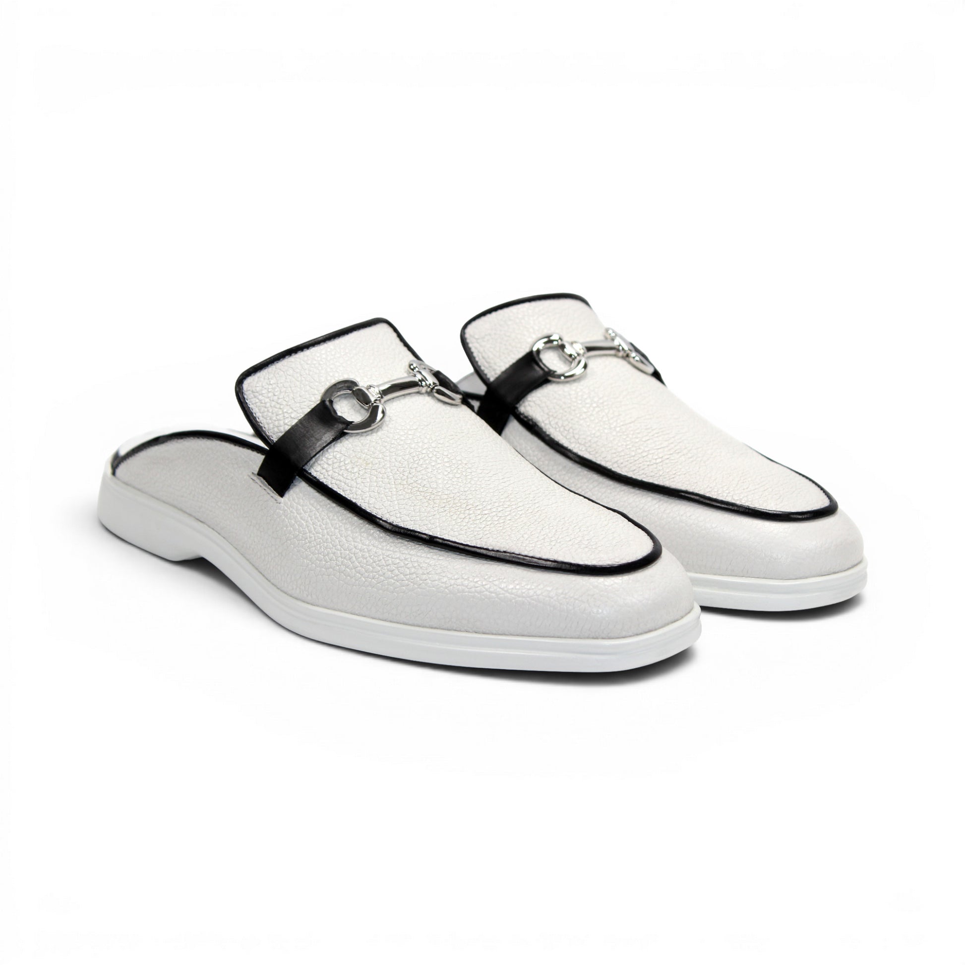 The Duca Di Matiste Duca SA493 White/Black is a white Italian leather slip-on mule with a black trim, low heel, metal buckle, and durable rubber sole, shown in profile against a plain white background.