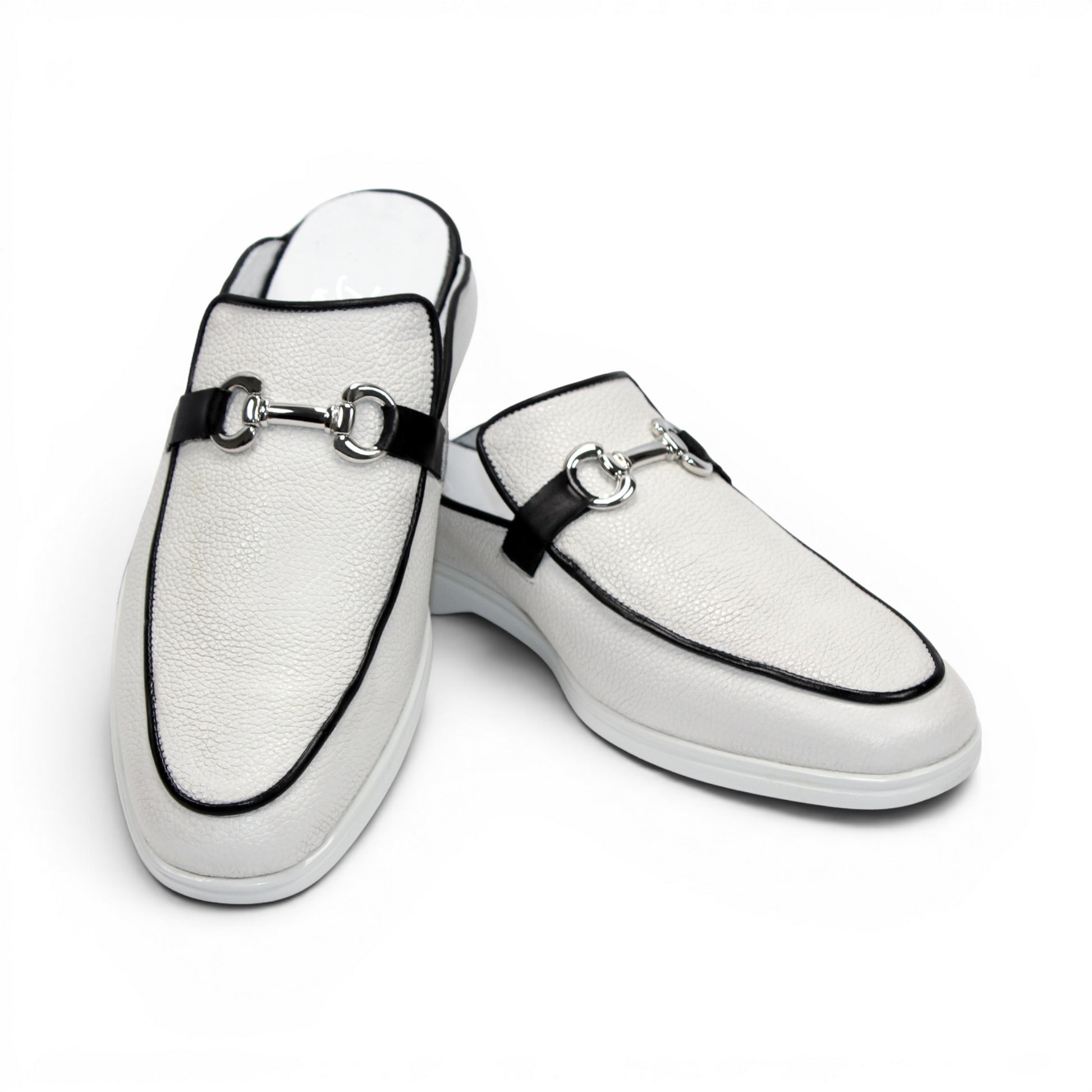 The Duca Di Matiste Duca SA493 White/Black is a white Italian leather slip-on mule with a black trim, low heel, metal buckle, and durable rubber sole, shown in profile against a plain white background.