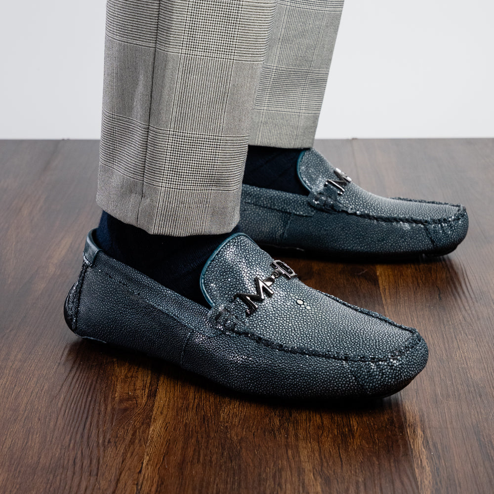 Navy blue textured leather Salermo Navy loafers by Marco Di Milano featuring a silver-tone metal bit across the top and black rubber outsoles.