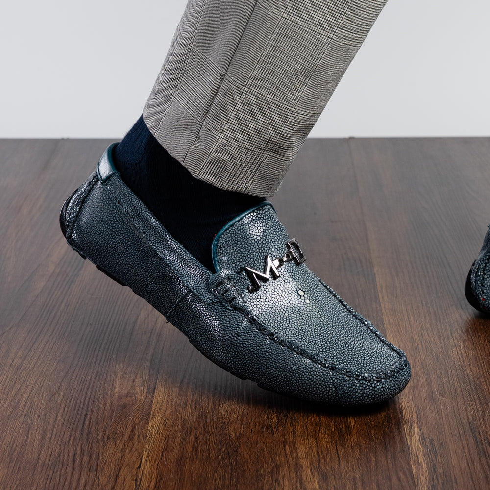 Navy blue textured leather Salermo Navy loafers by Marco Di Milano featuring a silver-tone metal bit across the top and black rubber outsoles.