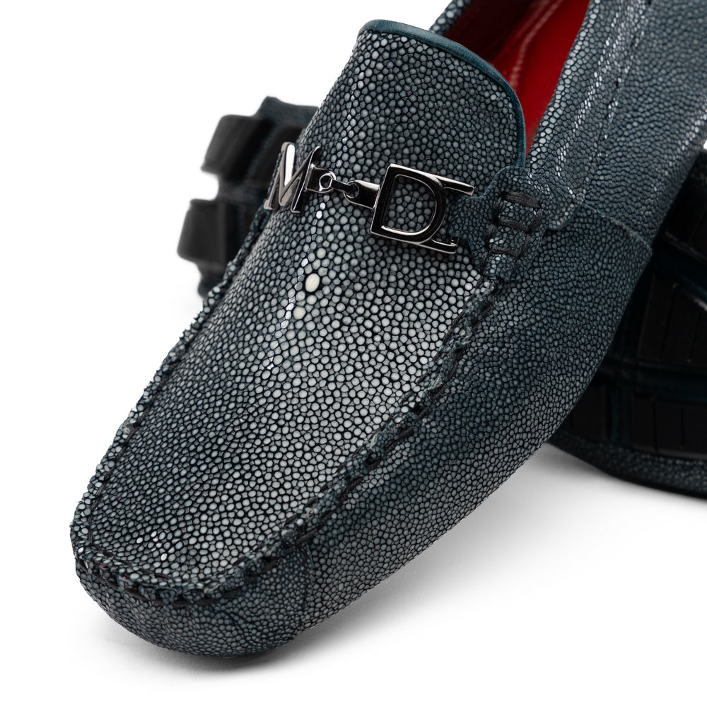 Navy blue textured leather Salermo Navy loafers by Marco Di Milano featuring a silver-tone metal bit across the top and black rubber outsoles.