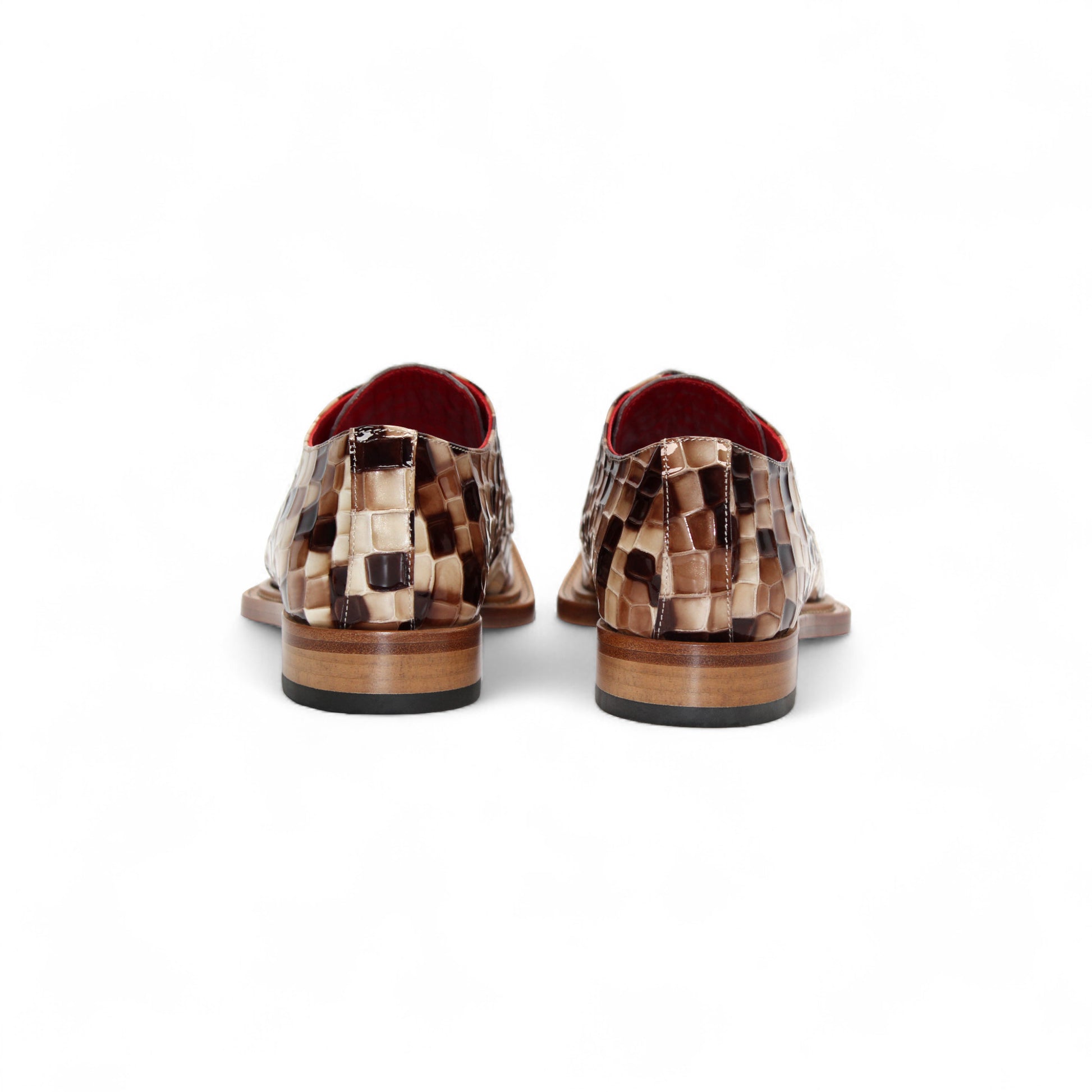 The Emilio Franco Couture Santo Brown Combo by Emilio Franco Couture features a woven checkerboard design in brown and beige, red lining, and a wooden sole—blending luxury and Italian-inspired elegance.