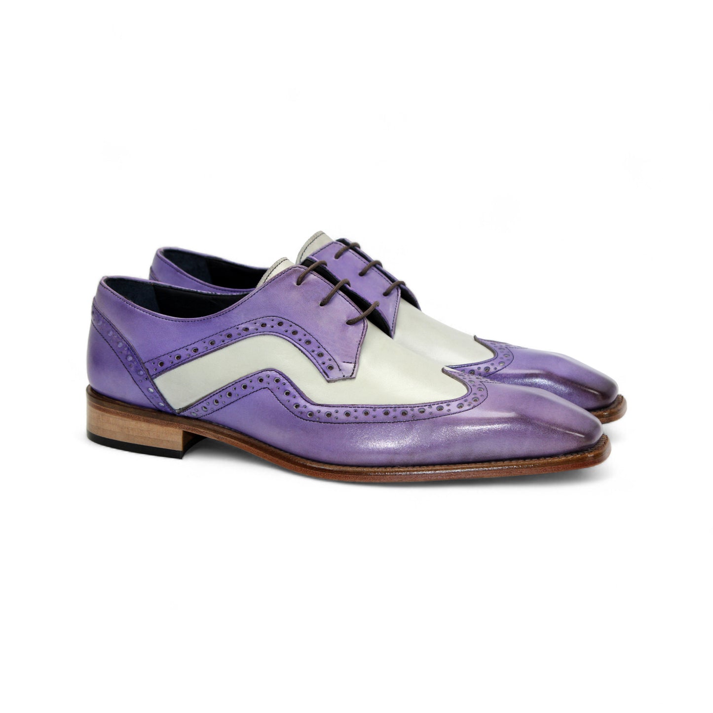 The Duca Di Matiste Duca Saranno Lavender/Panna is an Italian-made two-tone dress shoe in purple and white leather, with decorative perforations and a wooden sole, shown in a side view.