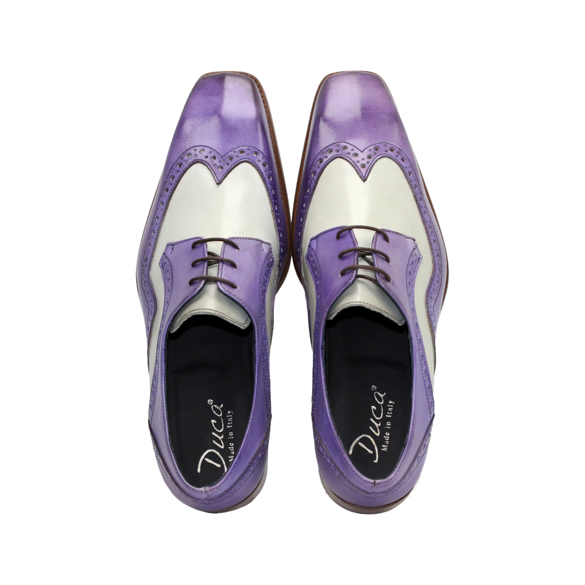 The Duca Di Matiste Duca Saranno Lavender/Panna is an Italian-made two-tone dress shoe in purple and white leather, with decorative perforations and a wooden sole, shown in a side view.