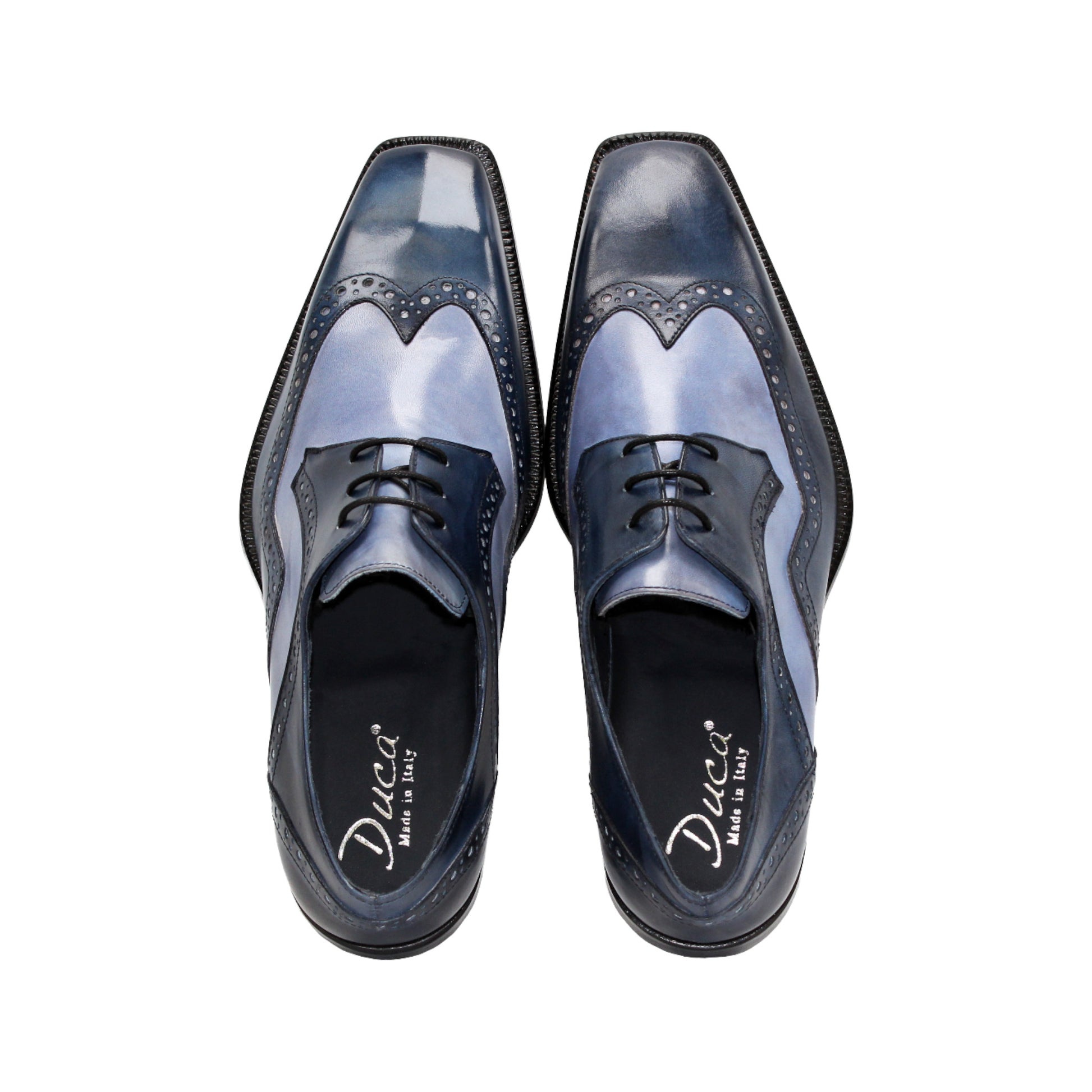 The Duca Di Matiste Duca Saranno Navy/Light Blue men’s dress shoe features genuine leather in blue tones, decorative stitching, perforated accents, and a black sole, displayed in profile on a white background.