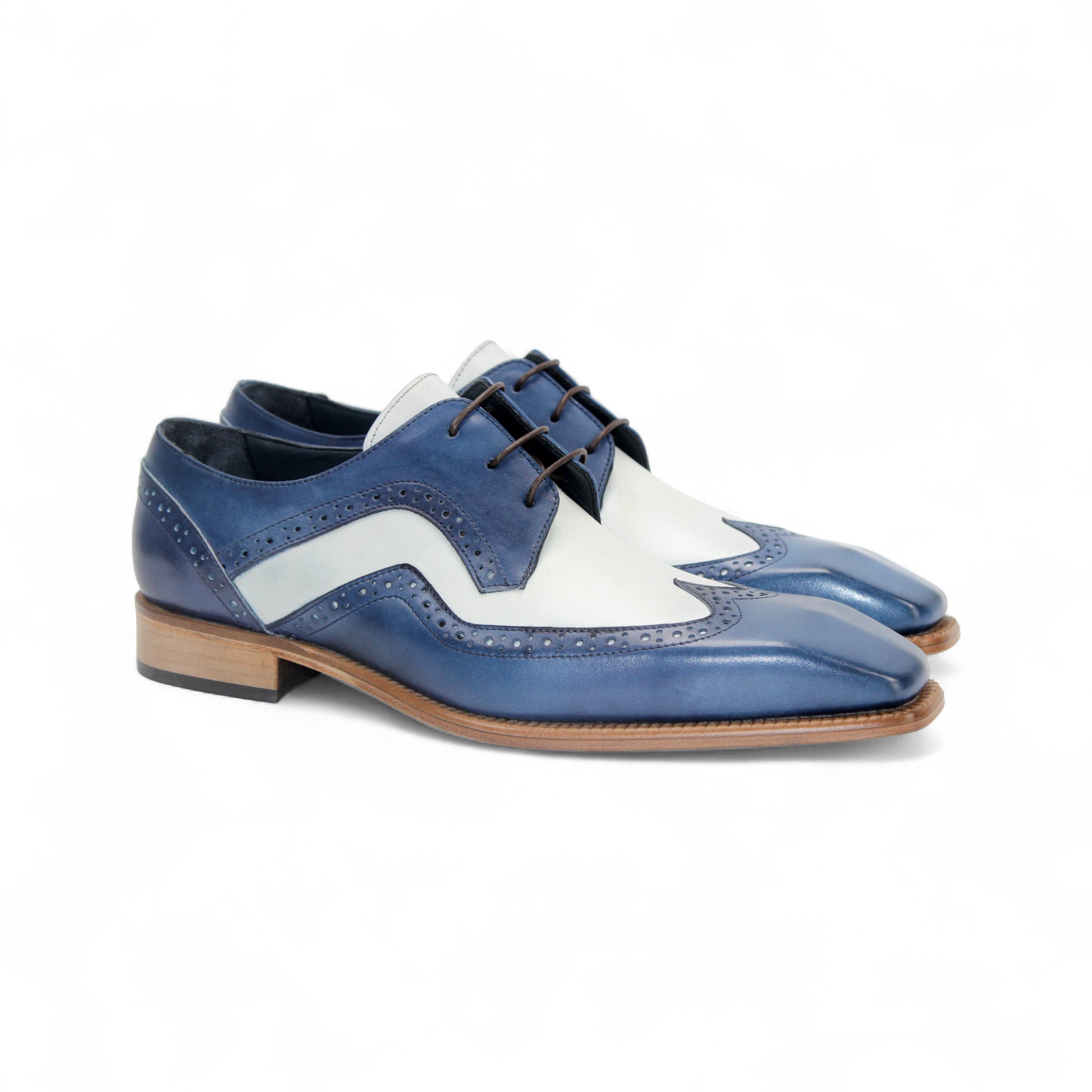 The Duca Di Matiste Duca Saranno Spring Blue/White is an Italian leather oxford dress shoe with perforated detailing, lace-up closure, and a low wooden heel, shown in profile on a white background.