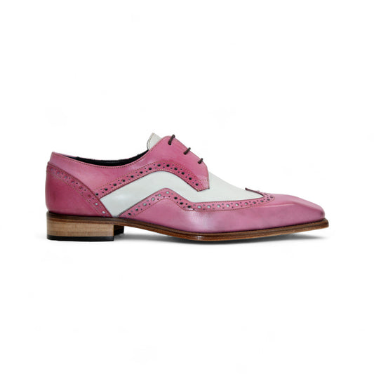 Duca Di Matiste’s Duca Saranno Pink/Panna is a two-tone oxford dress shoe in pink and white genuine leather with brogue detailing, wood sole, and lace-up closure—elegantly crafted in Italy and shown in profile on a white background.