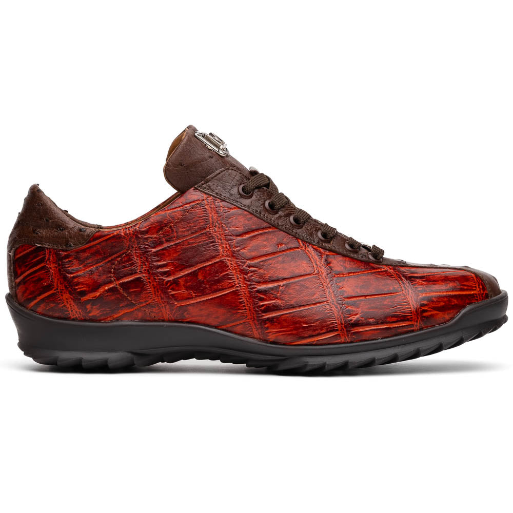 The Saulo Cognac sneakers by Marco Di Milano feature genuine alligator leather in red and brown with black laces and soles—an exceptional luxury men's footwear choice, shown with one upright and the other lying on its side.