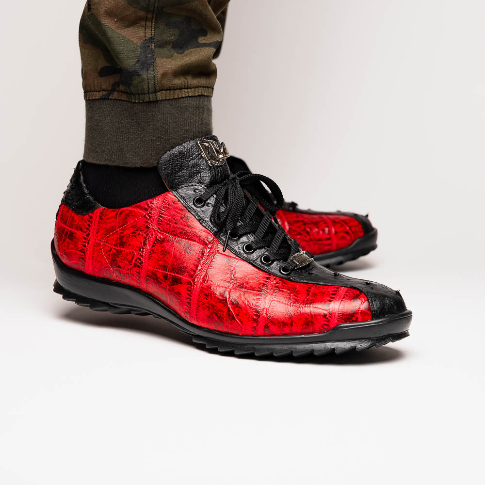 The Saulo BlackCherry by Marco Di Milano features red and black crocodile-patterned leather, black laces, and textured black rubber soles—making a bold statement in luxury men's footwear.