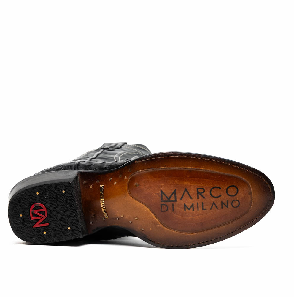 A pair of handcrafted Savannah Black western boots by Marco Di Milano; one boot stands upright while the other lies on its side, displaying a branded sole with "Marco Di Milano.