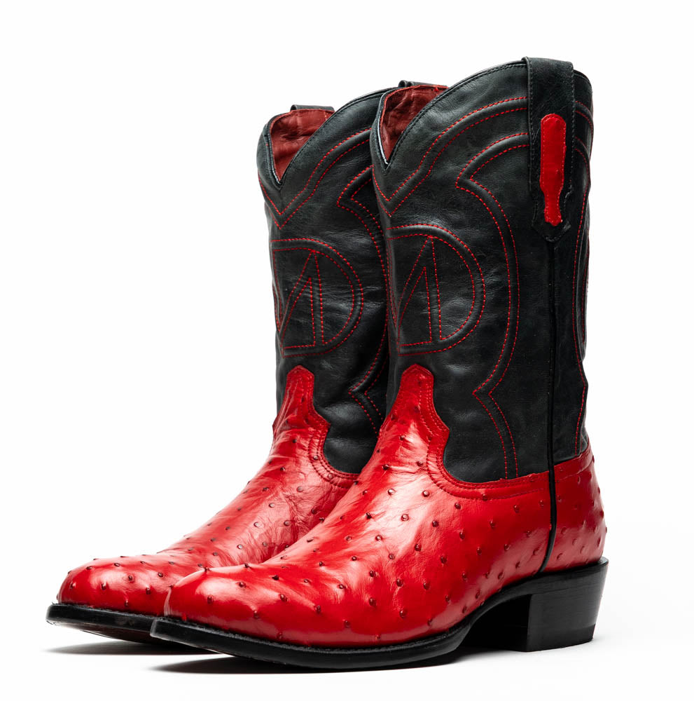 The Savannah Red by Marco Di Milano is a handcrafted western boot with red genuine full-quill ostrich leather, a black upper shaft accented with red stitching, and the Marco Di Milano logo featured on the sole.