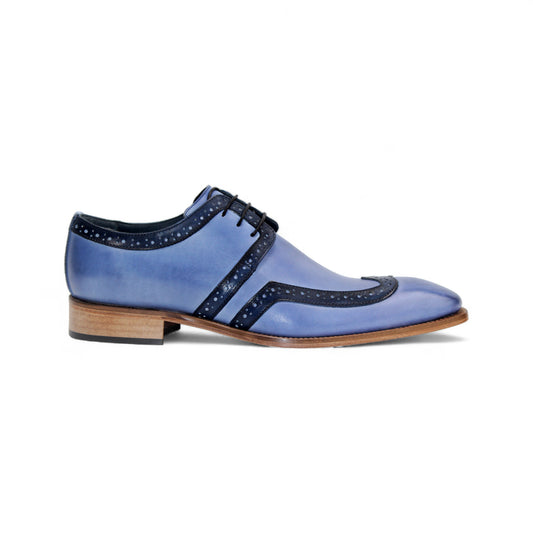The Duca Di Matiste Duca Savona L.Blue/Blue is a blue genuine leather dress shoe with black detailing, black laces, and a brown wooden sole, displayed from the side on a white background.