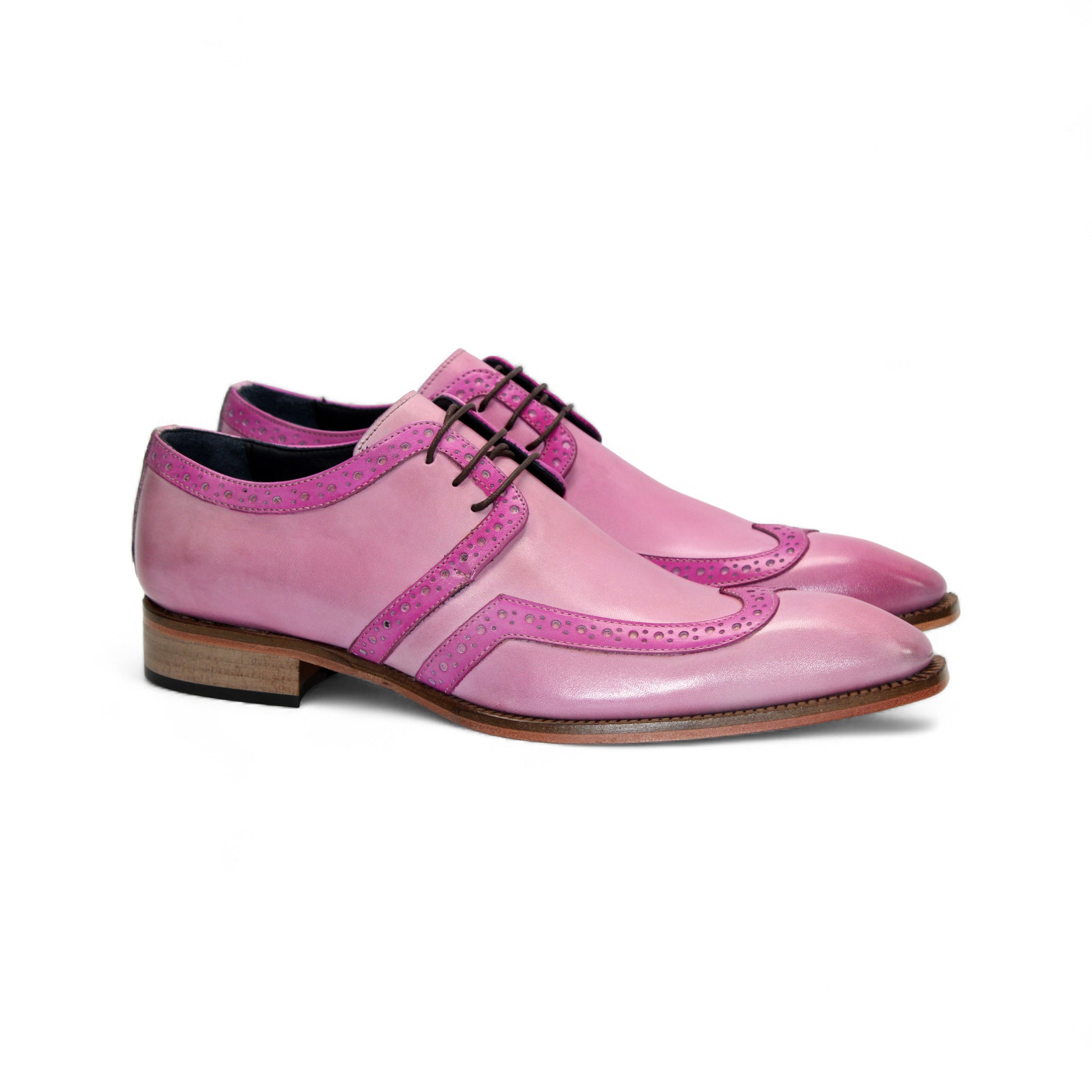 The Duca Di Matiste Duca Savona Pink/Fuscia is a genuine leather dress shoe with brogue detailing, wooden sole, and black laces. It has a minimalist silhouette and is displayed in side profile on a white background.