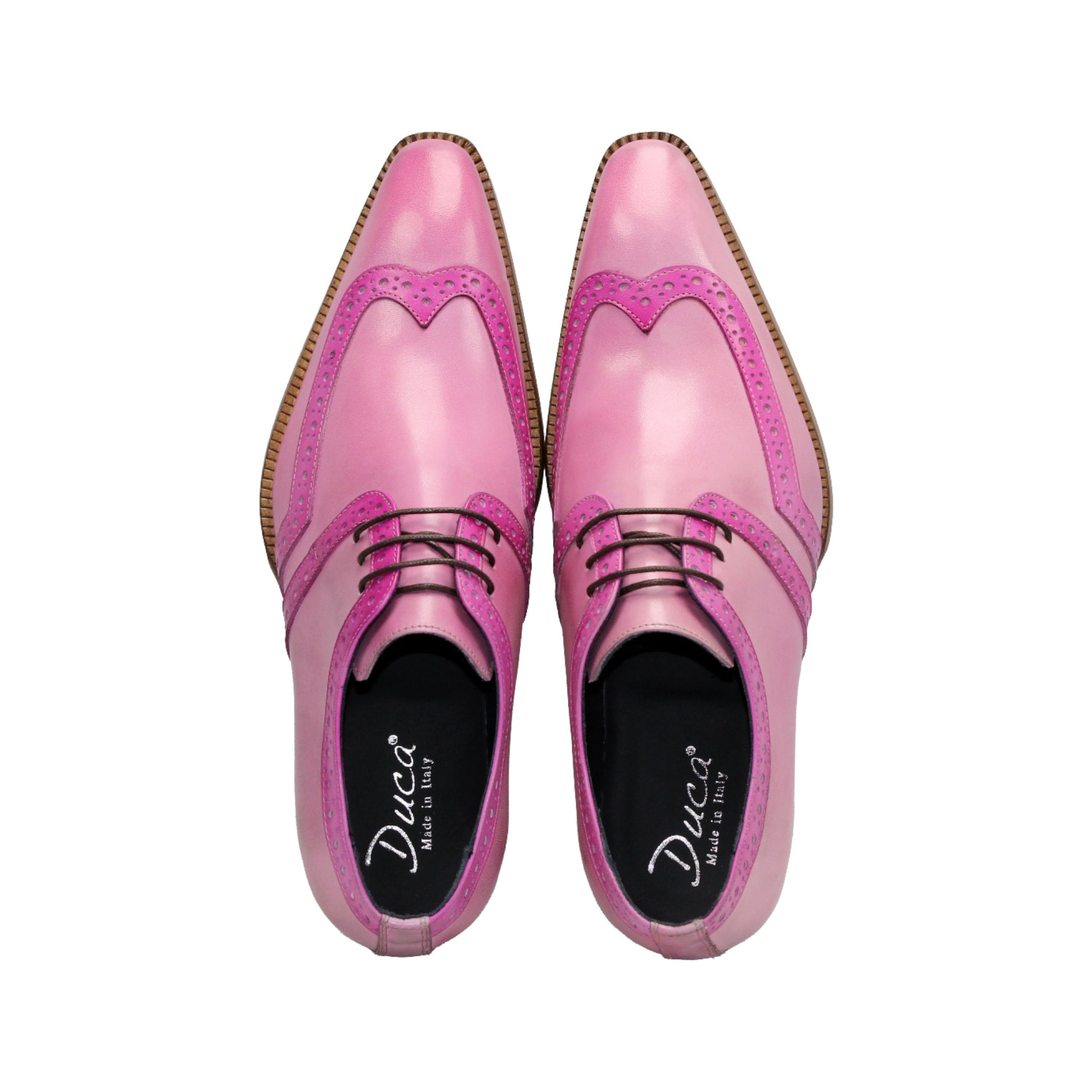 The Duca Di Matiste Duca Savona Pink/Fuscia is a genuine leather dress shoe with brogue detailing, wooden sole, and black laces. It has a minimalist silhouette and is displayed in side profile on a white background.