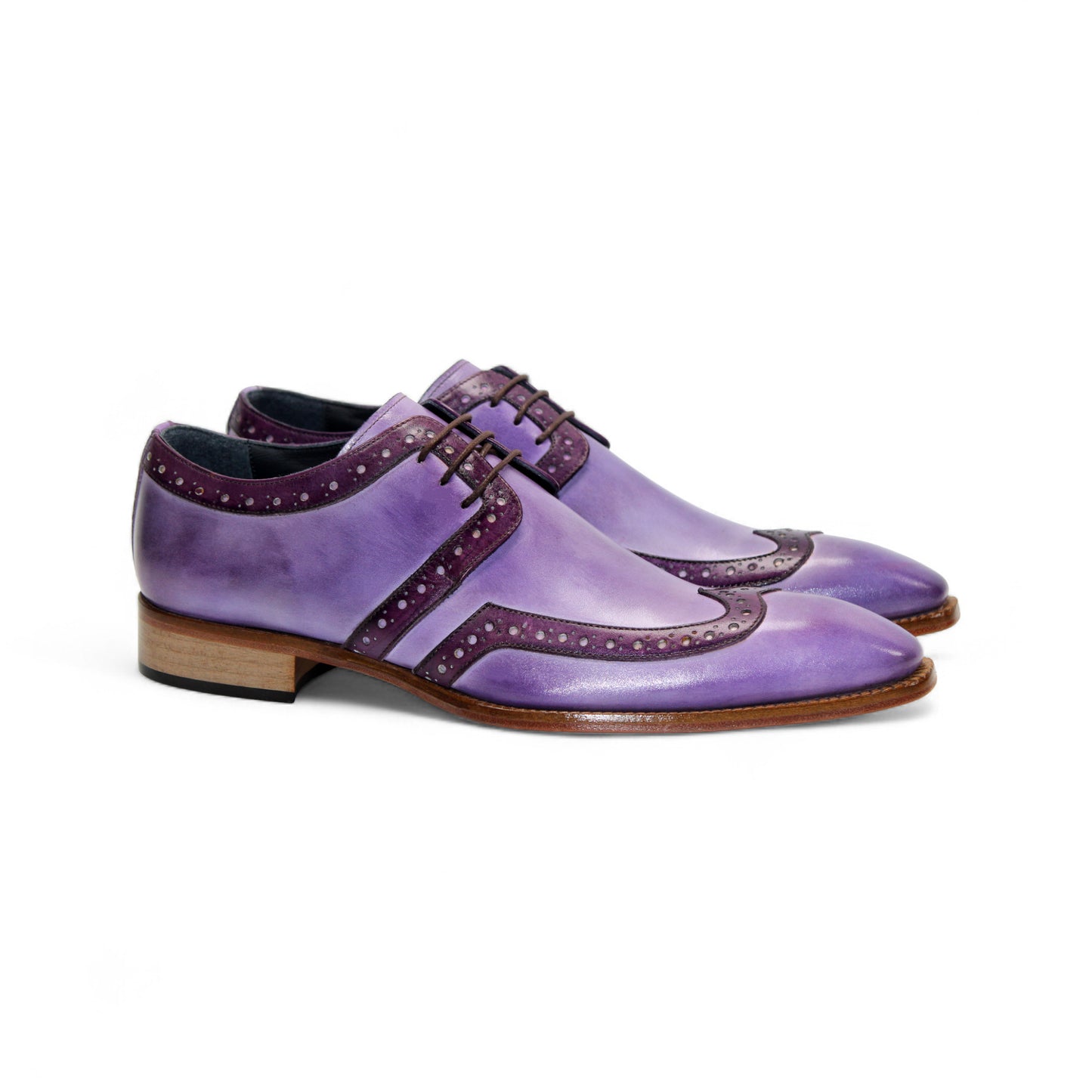 The Duca Di Matiste Duca Savona Lavender/Purple is a genuine leather dress shoe with dark purple detailing, brown sole, and laces—ideal for those seeking minimalist style with a distinctive touch. Shown in profile on a white background.