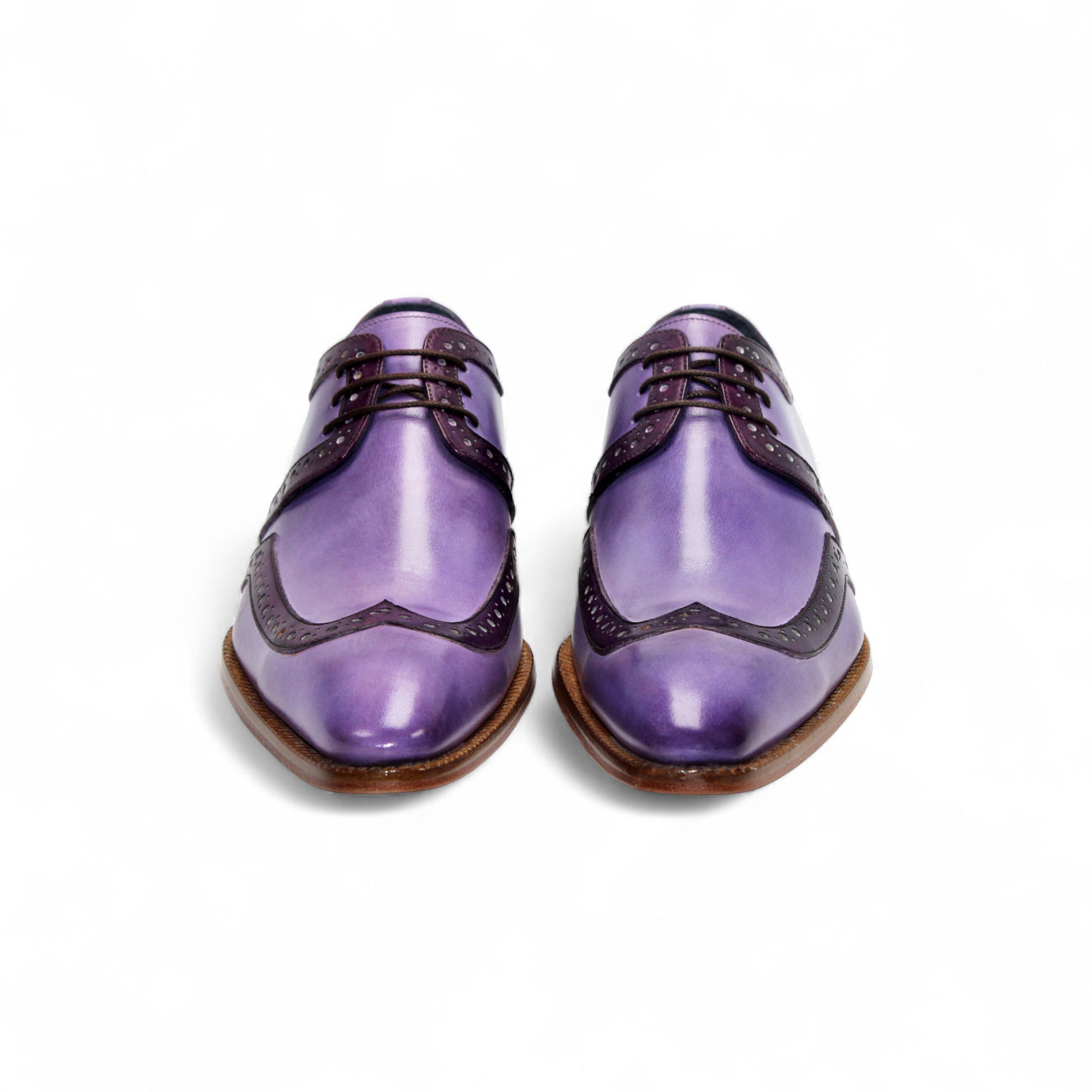 The Duca Di Matiste Duca Savona Lavender/Purple is a genuine leather dress shoe with dark purple detailing, brown sole, and laces—ideal for those seeking minimalist style with a distinctive touch. Shown in profile on a white background.