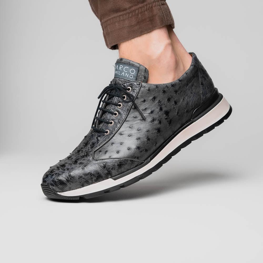 The Marco Di Milano Scanno Antique Gray sneakers feature genuine ostrich quill leather with a hand painted finish, black leather accents, white midsoles, and black rubber outsoles, displayed against a plain white background.