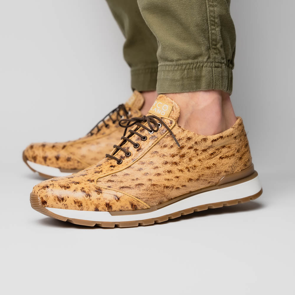 The Scanno Antique Orix by Marco Di Milano is a pair of tan, textured lace-up casual shoes with a hand-painted finish and brown rubber soles, shown against a white background—ideal for luxury footwear enthusiasts.