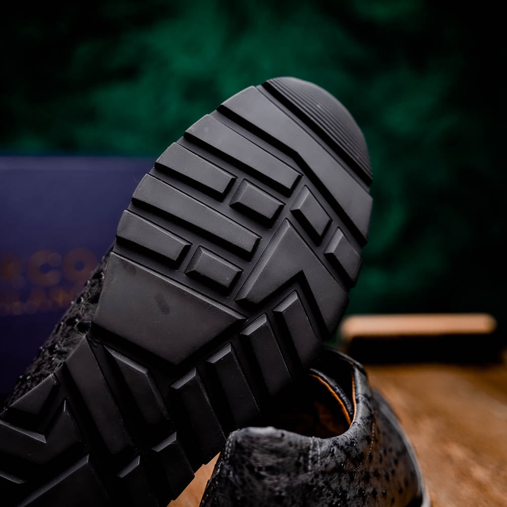 The Marco Di Milano Scanno Antique Gray sneakers feature genuine ostrich quill leather with a hand painted finish, black leather accents, white midsoles, and black rubber outsoles, displayed against a plain white background.