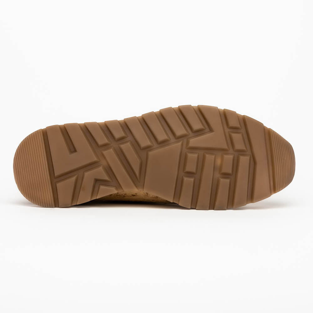 The Scanno Antique Cognac by Marco Di Milano is a brown leather sneaker with an ostrich-patterned, hand-painted finish, white midsole, brown outsole, and brand logo on the tongue—ideal for genuine ostrich quill sneaker fans. Photographed on a plain background.