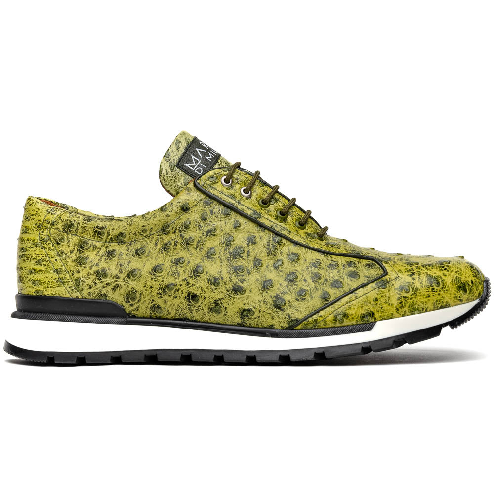The Marco Di Milano Scanno Antique Green sneakers feature textured genuine ostrich quill in green, black laces, and white soles, with one shoe upright and the other propped beneath—exuding luxury footwear style.