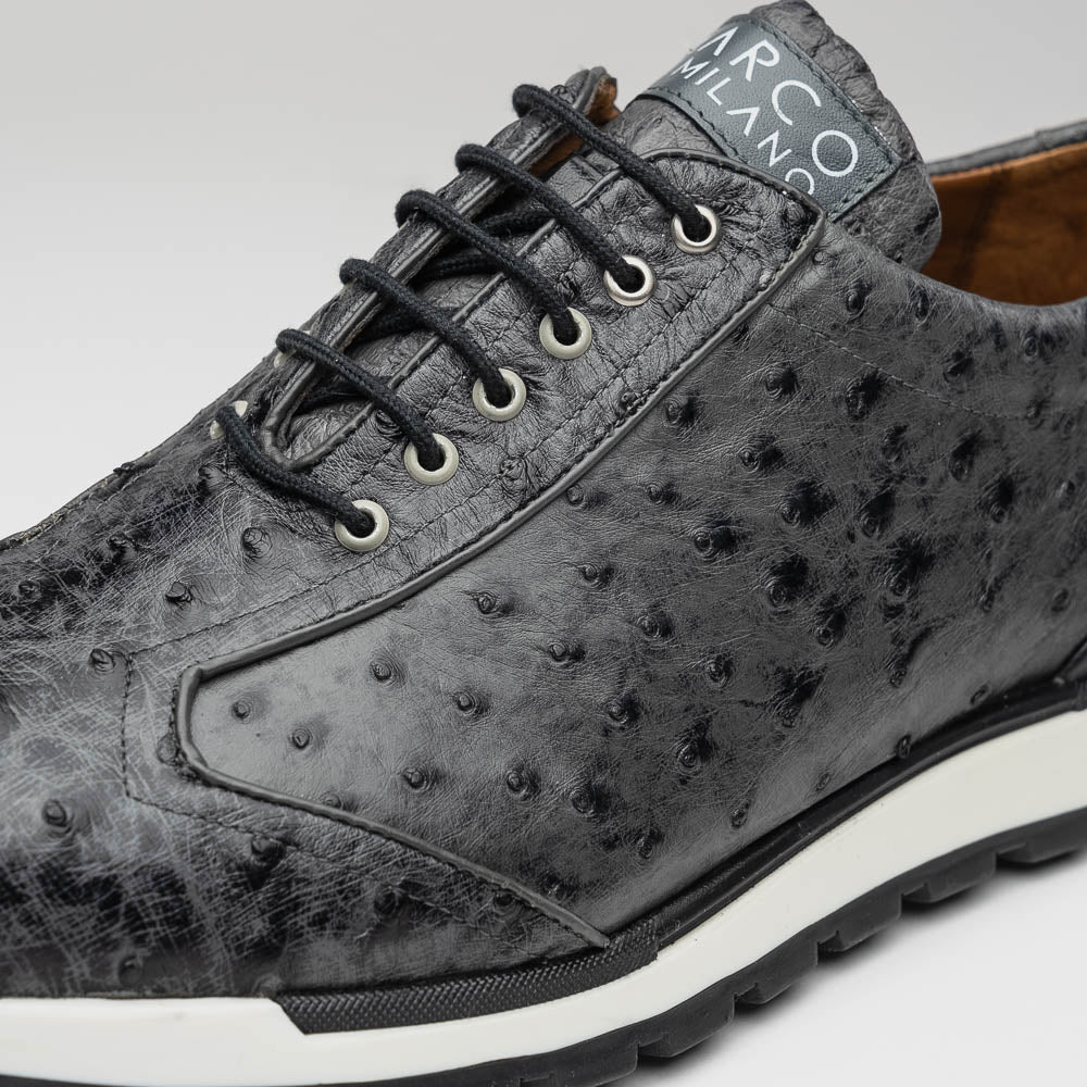The Marco Di Milano Scanno Antique Gray sneakers feature genuine ostrich quill leather with a hand painted finish, black leather accents, white midsoles, and black rubber outsoles, displayed against a plain white background.