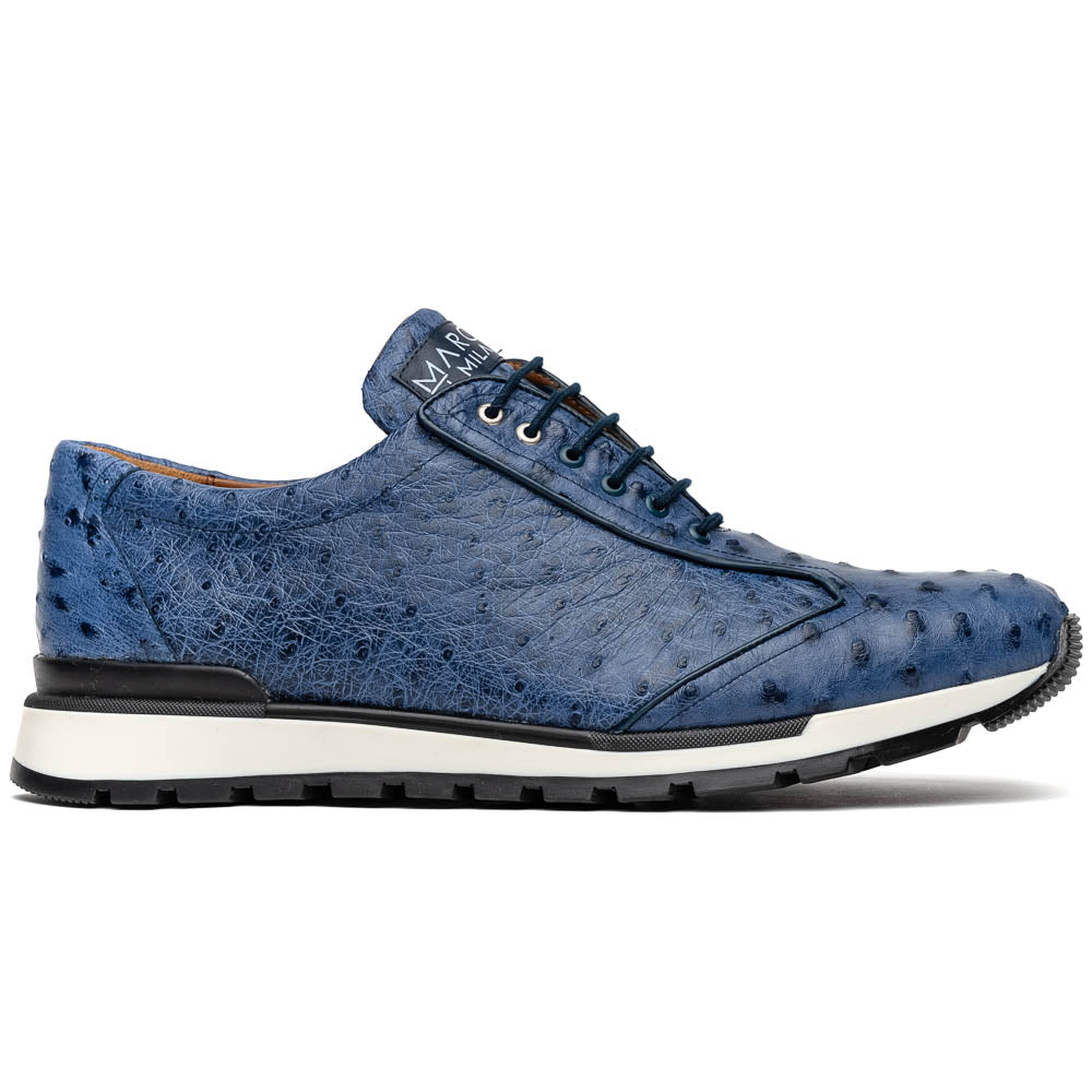 The Marco Di Milano Scanno Antique Navy sneaker features genuine ostrich quill leather in blue, black laces, a white and black rubber sole, and textured details—luxury footwear displayed on a white background.