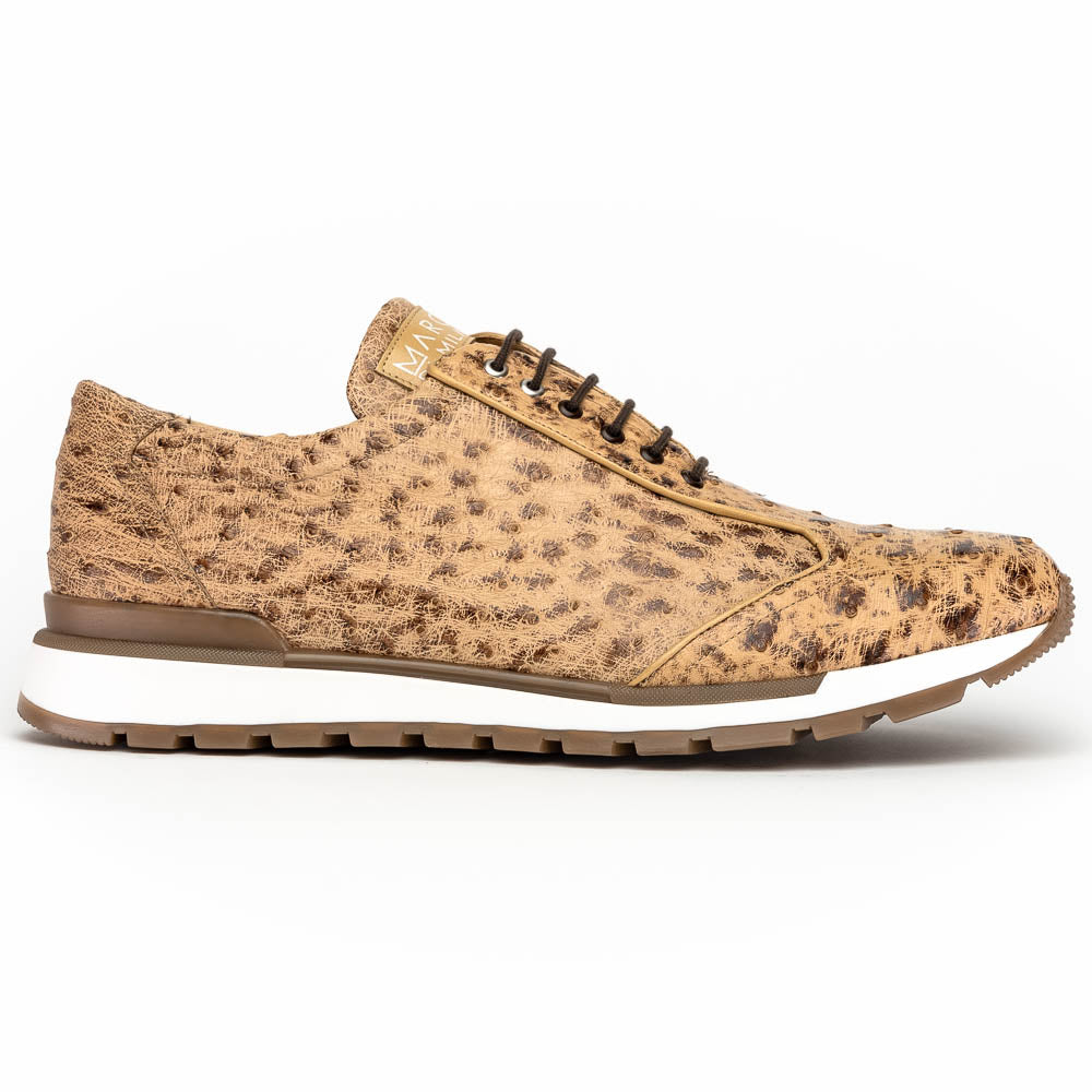 The Scanno Antique Orix by Marco Di Milano is a pair of tan, textured lace-up casual shoes with a hand-painted finish and brown rubber soles, shown against a white background—ideal for luxury footwear enthusiasts.