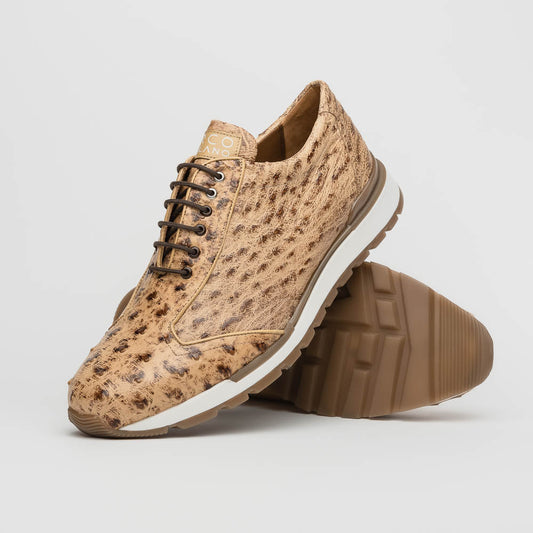 The Scanno Antique Orix by Marco Di Milano is a pair of tan, textured lace-up casual shoes with a hand-painted finish and brown rubber soles, shown against a white background—ideal for luxury footwear enthusiasts.