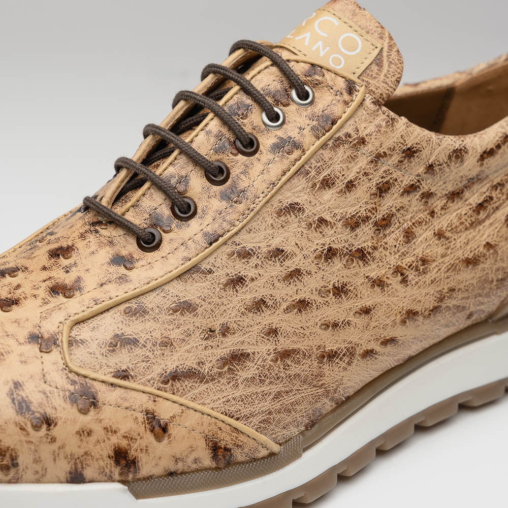 The Scanno Antique Orix by Marco Di Milano is a pair of tan, textured lace-up casual shoes with a hand-painted finish and brown rubber soles, shown against a white background—ideal for luxury footwear enthusiasts.