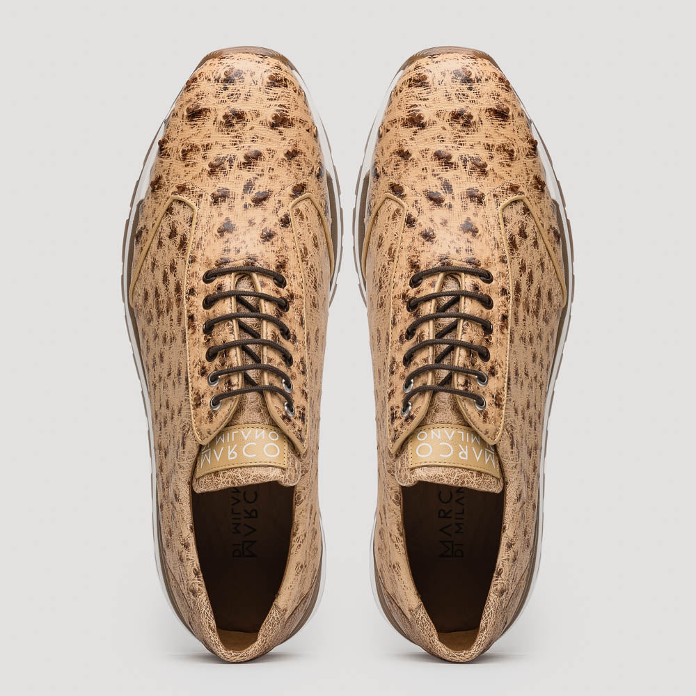 The Scanno Antique Orix by Marco Di Milano is a pair of tan, textured lace-up casual shoes with a hand-painted finish and brown rubber soles, shown against a white background—ideal for luxury footwear enthusiasts.