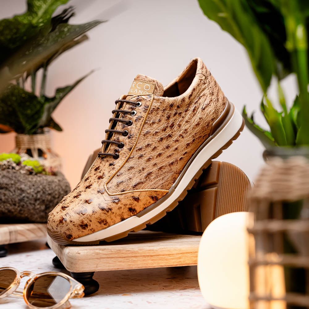 The Scanno Antique Orix by Marco Di Milano is a pair of tan, textured lace-up casual shoes with a hand-painted finish and brown rubber soles, shown against a white background—ideal for luxury footwear enthusiasts.