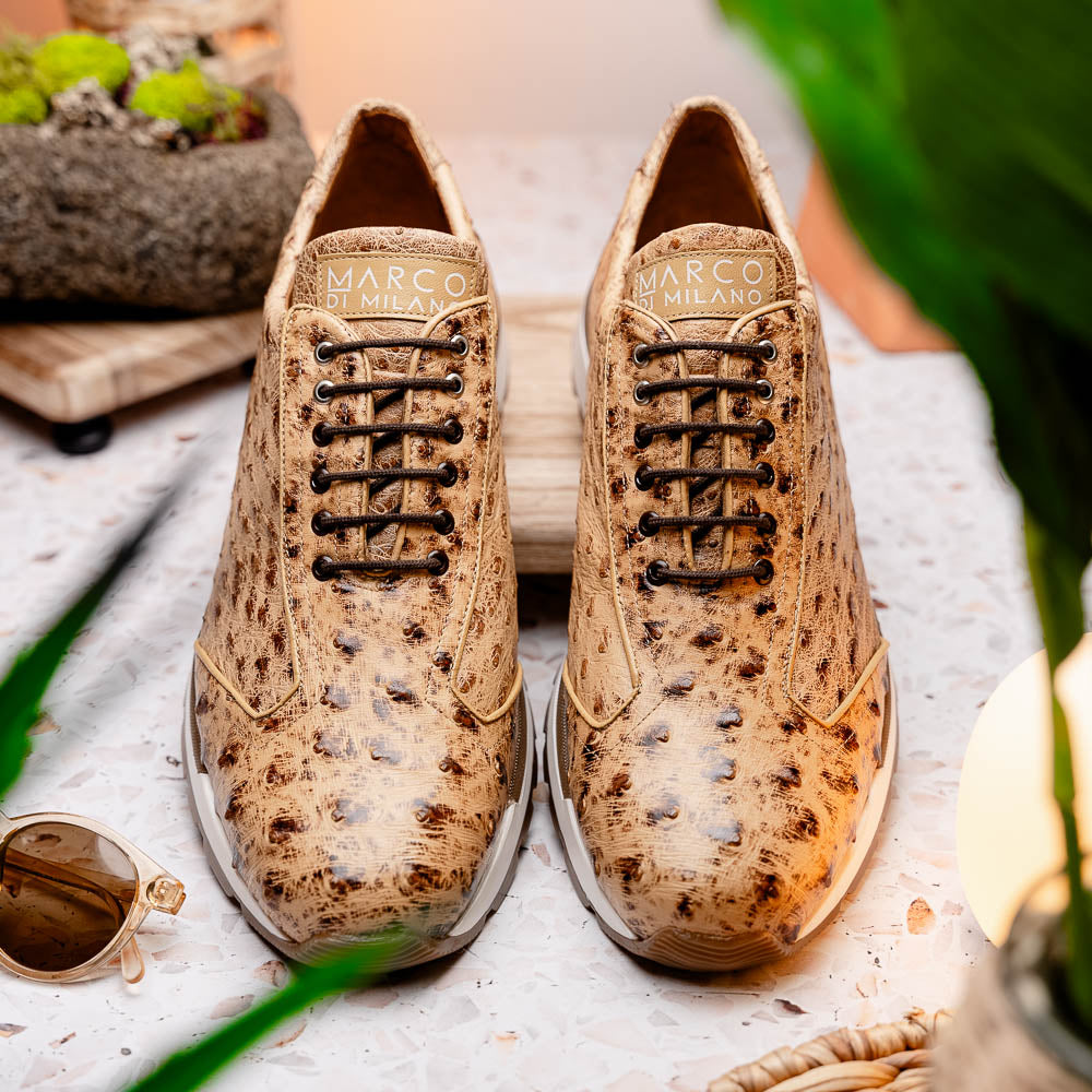 The Scanno Antique Orix by Marco Di Milano is a pair of tan, textured lace-up casual shoes with a hand-painted finish and brown rubber soles, shown against a white background—ideal for luxury footwear enthusiasts.