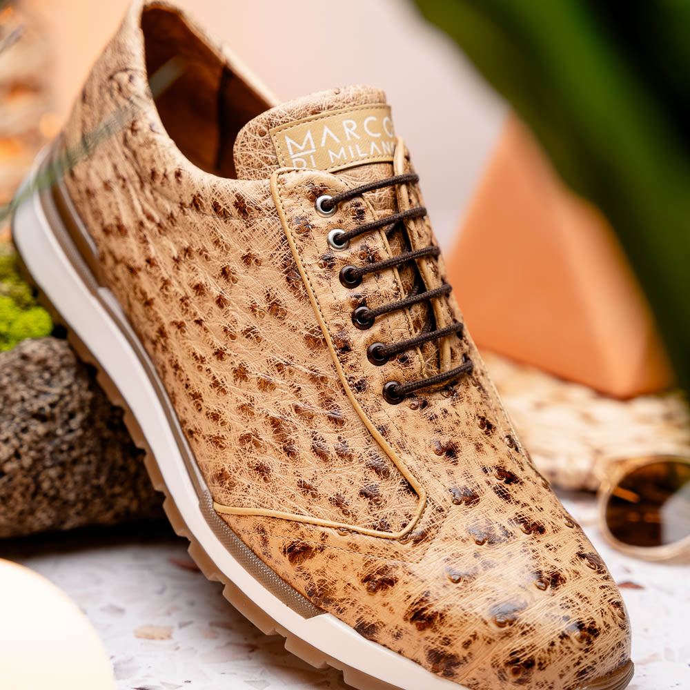 The Scanno Antique Orix by Marco Di Milano is a pair of tan, textured lace-up casual shoes with a hand-painted finish and brown rubber soles, shown against a white background—ideal for luxury footwear enthusiasts.