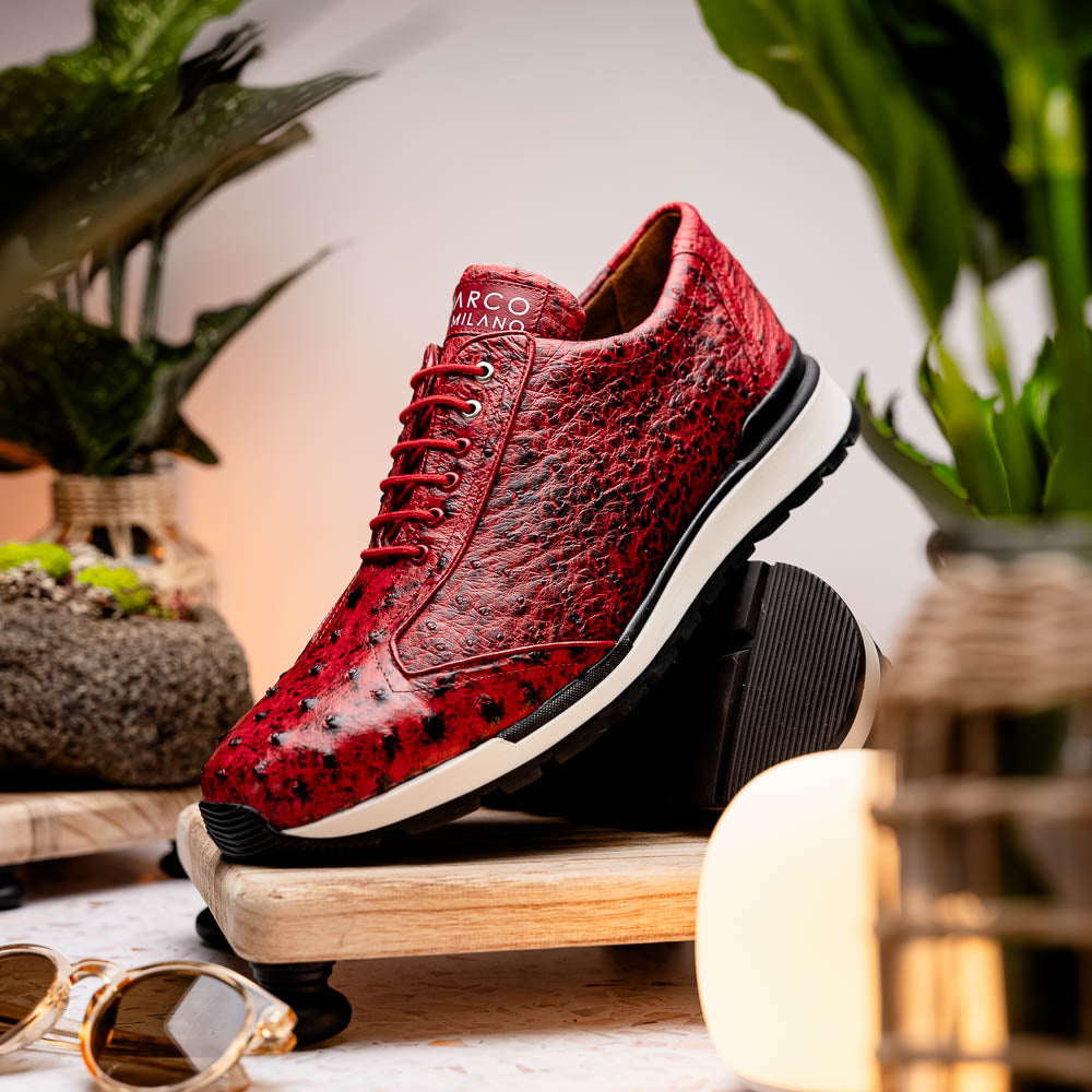 The Marco Di Milano Scanno Antique Red is a luxury fashion sneaker in textured genuine ostrich quill leather with black and white rubber soles, shown upright and on its side against a plain white background.