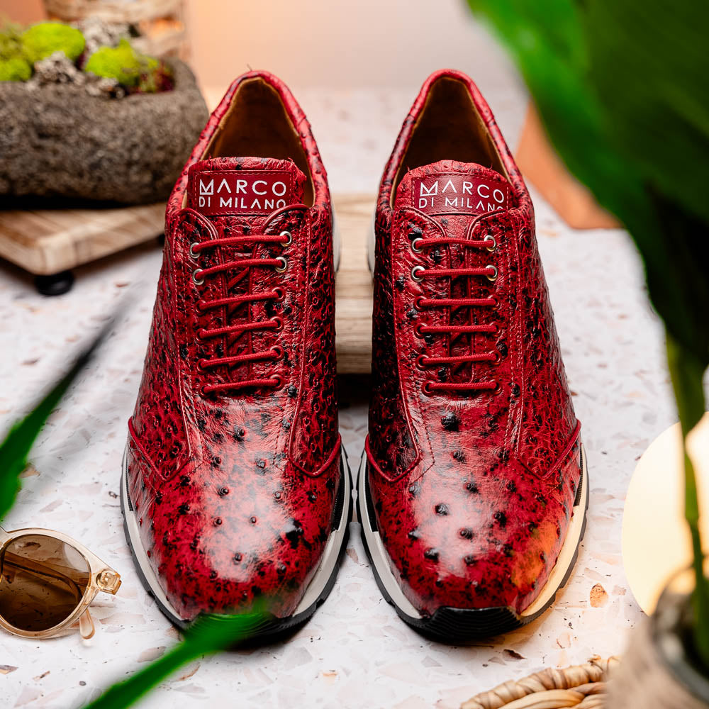 The Marco Di Milano Scanno Antique Red is a luxury fashion sneaker in textured genuine ostrich quill leather with black and white rubber soles, shown upright and on its side against a plain white background.