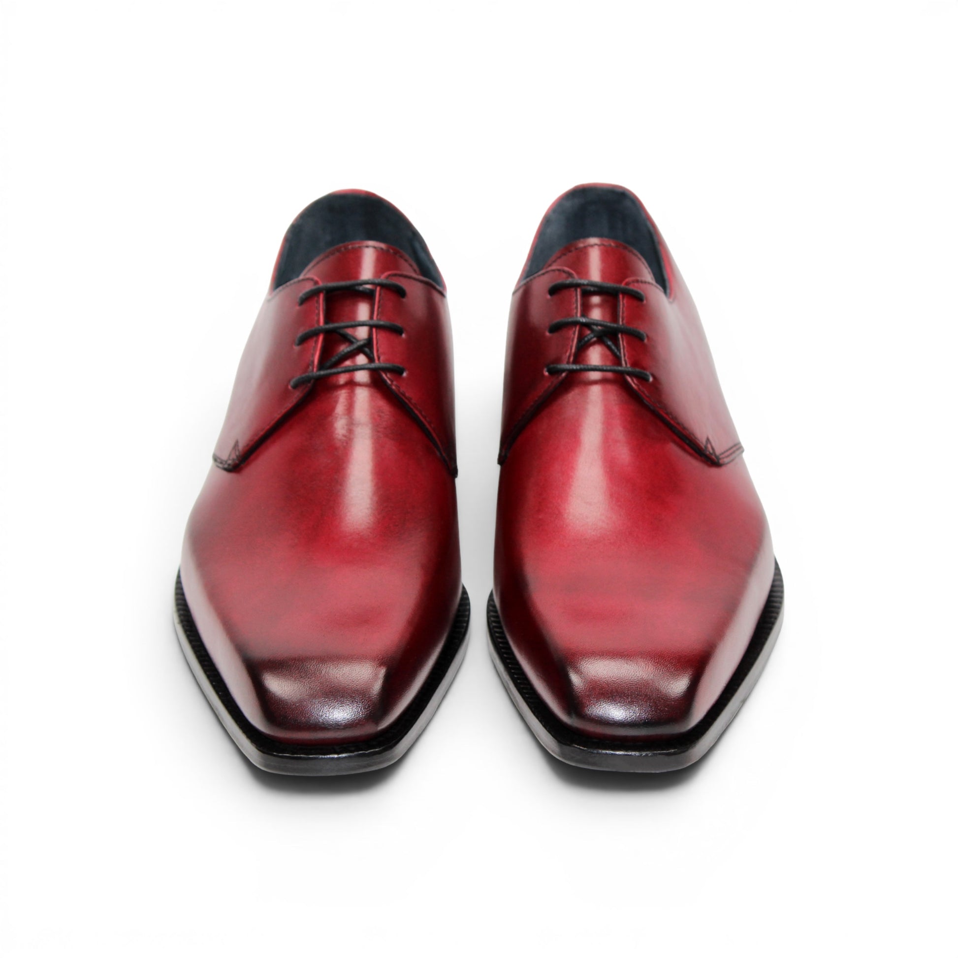 The Duca Di Matiste Duca Sermoneta Antique Red is a premium Italian calf leather dress shoe in red, featuring black laces and a black sole. Displayed in profile on white, it's ideal for classic elegance lovers.