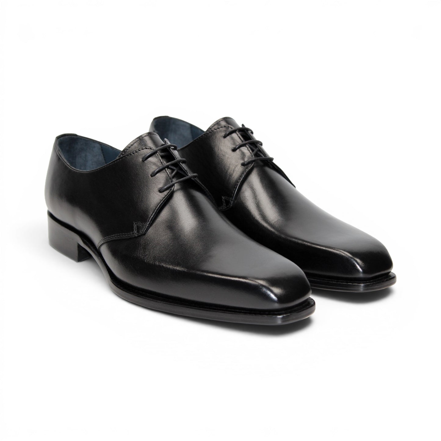 The Duca Sermoneta Black by Duca Di Matiste is a sleek, polished Italian leather dress shoe with laces and a low heel, exuding classic elegance against a white background.
