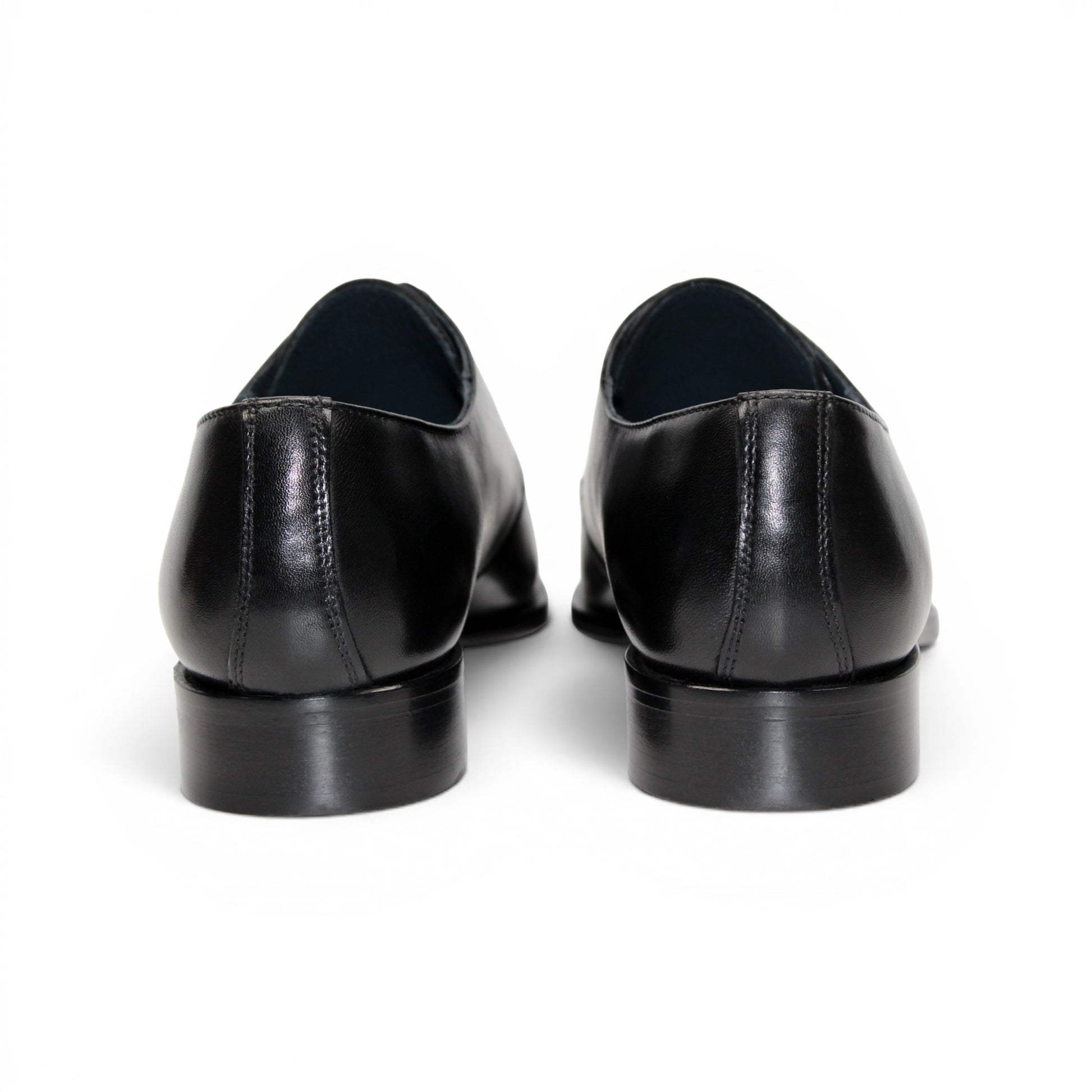The Duca Sermoneta Black by Duca Di Matiste is a sleek, polished Italian leather dress shoe with laces and a low heel, exuding classic elegance against a white background.