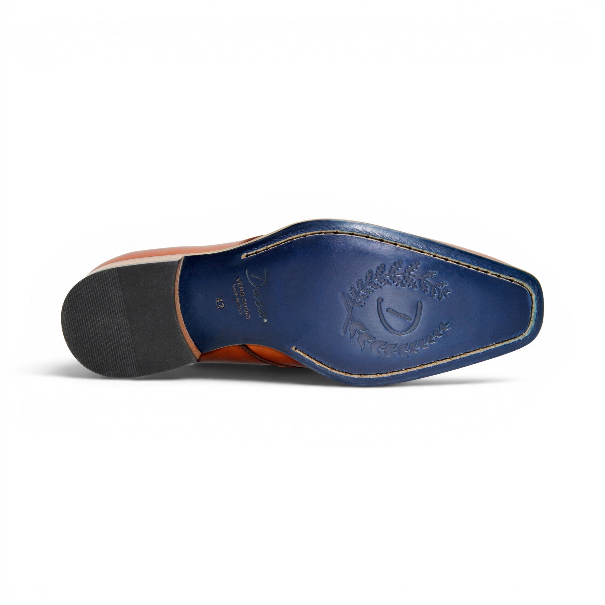The Duca Sermoneta Cognac by Duca Di Matiste, a classic brown Italian leather dress shoe with a low wooden heel and black lining, is shown in a side view against a white background, highlighting its timeless elegance.