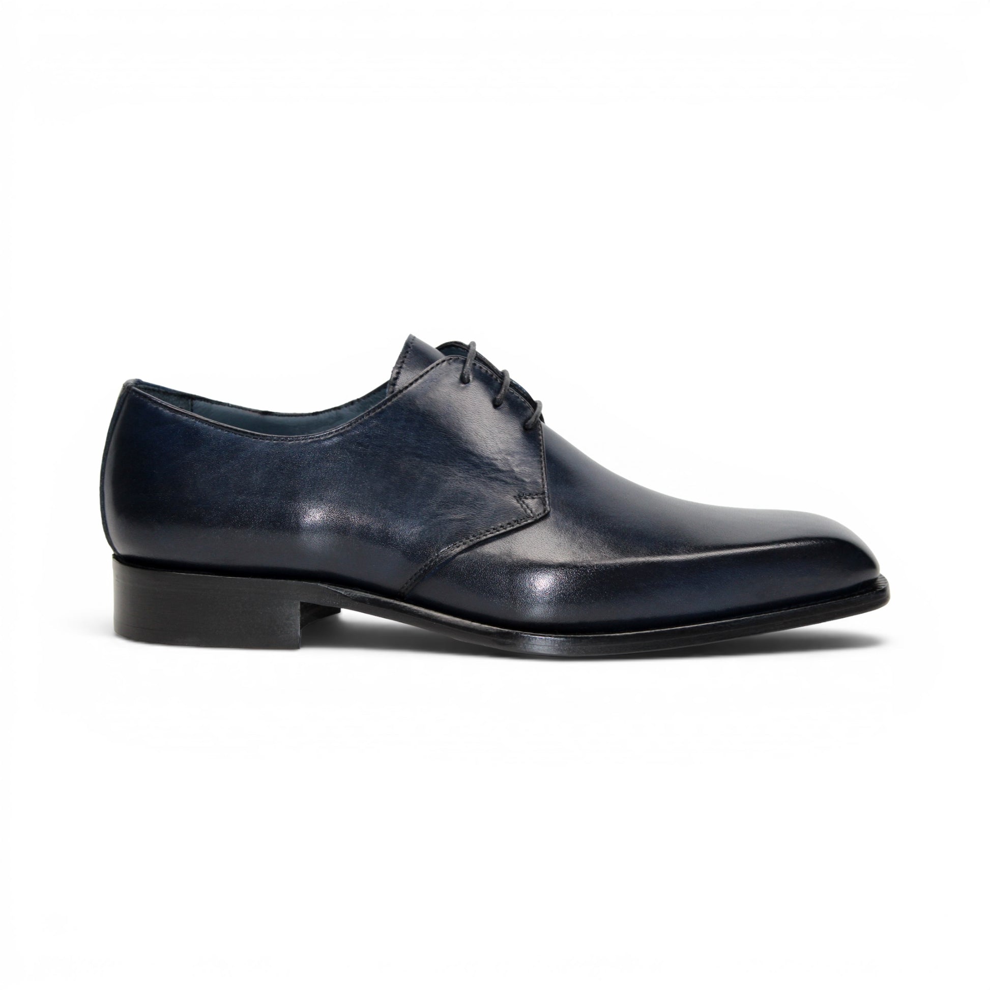 A side view of the Duca Sermoneta Navy by Duca Di Matiste—a navy leather oxford dress shoe with laces, crafted from premium calf leather, displayed on a white background.