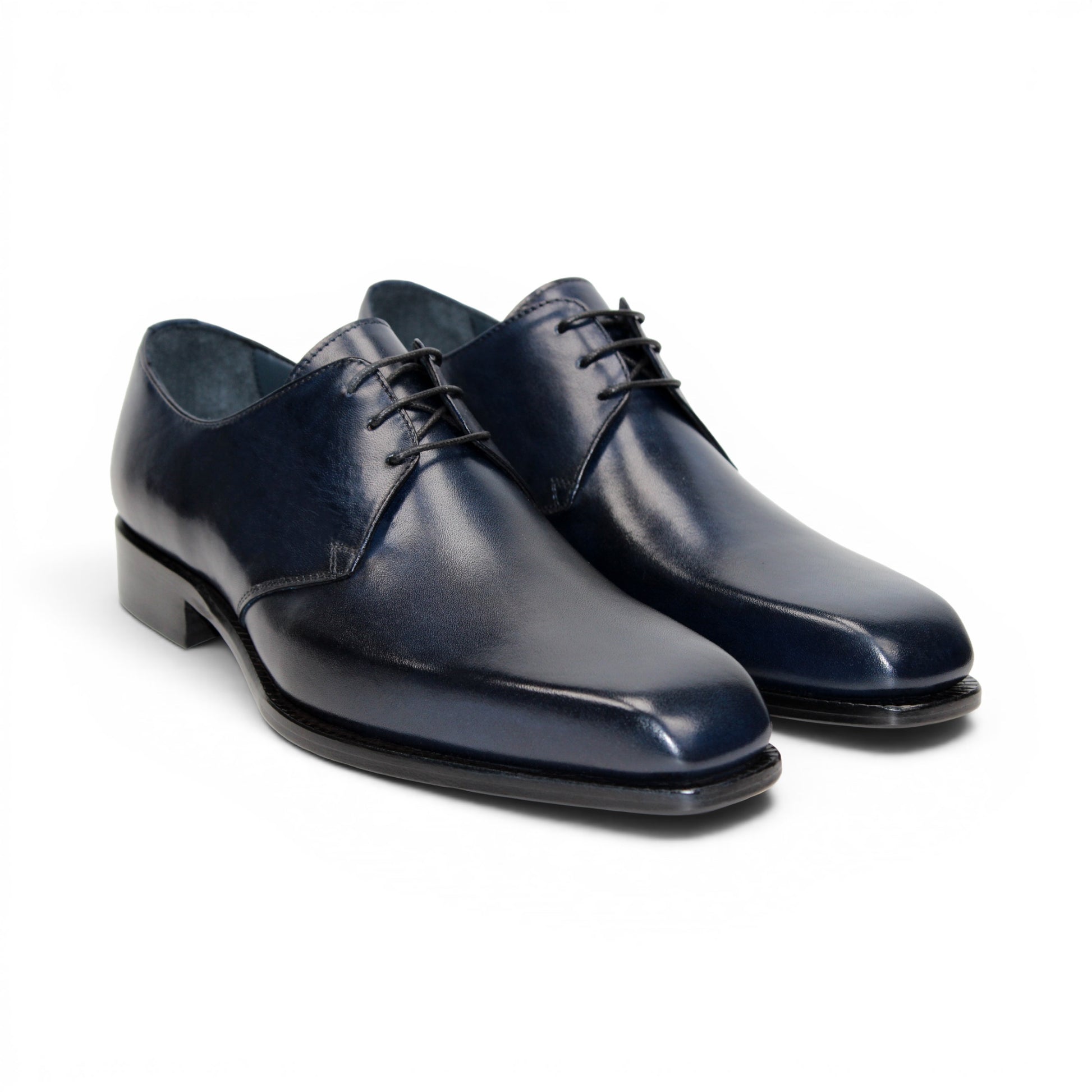 A side view of the Duca Sermoneta Navy by Duca Di Matiste—a navy leather oxford dress shoe with laces, crafted from premium calf leather, displayed on a white background.